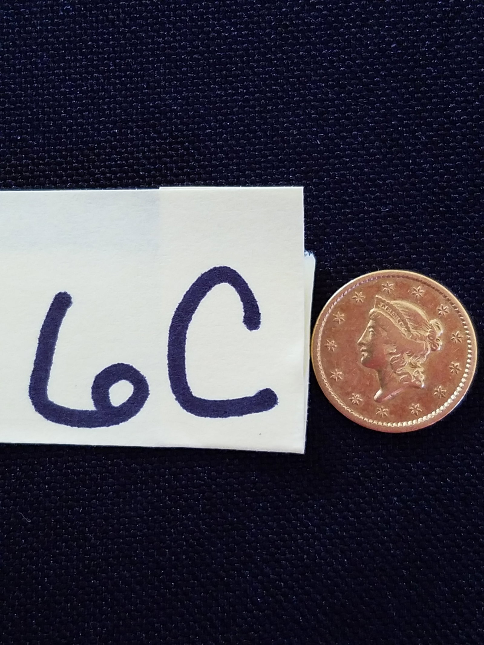 American 1851 $1 Liberty Head Gold Coin: American 1851 $1 Liberty Head gold coin. 90% gold. In circulated condition. See photos.