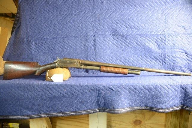Marlin Model 19: Marlin Model 19. 12 gauge pump hammer shotgun. Some pitting, finish is worn. Serial No. 78947.