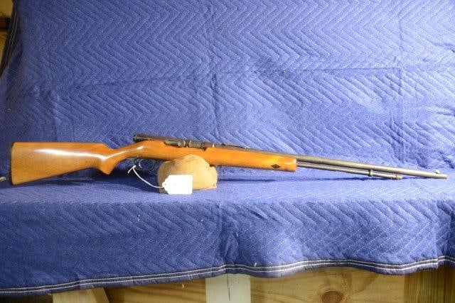 J. Stevens Arms Springfield 8A: J. Stevens Arms Springfield 8A. 22 S/L/LR semi-automatic. 24" barrel, badly pitted. Stock cracked and repaired. NSN.