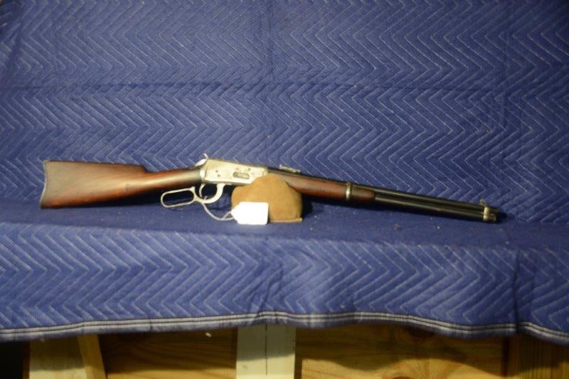 Winchester Model 94: Winchester Model 94. 30-30 with 20" barrel. Saddle ring. Dates to 1916. Finish worn, proper rear sight. Otherwise nice condition. Serial No. 790515.