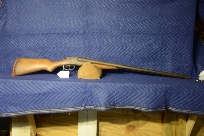 Springfield Arms Shotgun: Springfield Arms 16 gauge double barrel shotgun. 28" barrels. Mod and full chokes. Butt pad is damaged and gun is badly pitted. Serial No. 53010.