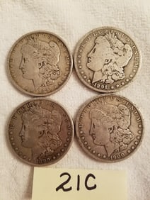 Four US Morgan Silver Dollars