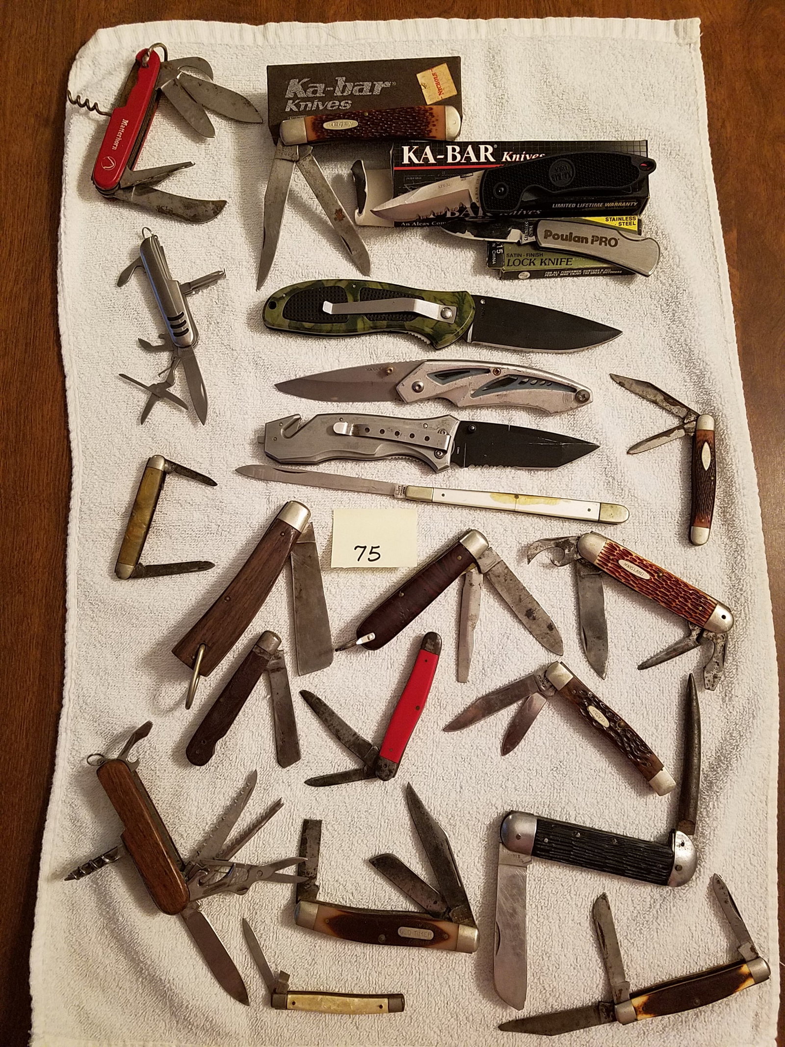 Assorted Lot of Pocket Knives: Assorted lot of pocket knives. 22 pocket knives manufactured by Schrade, Craftsman, Imperial, Camco, Frost Cutlery, M. Klein & Sons, Case, Sabre and Ka-bar. See photos.
