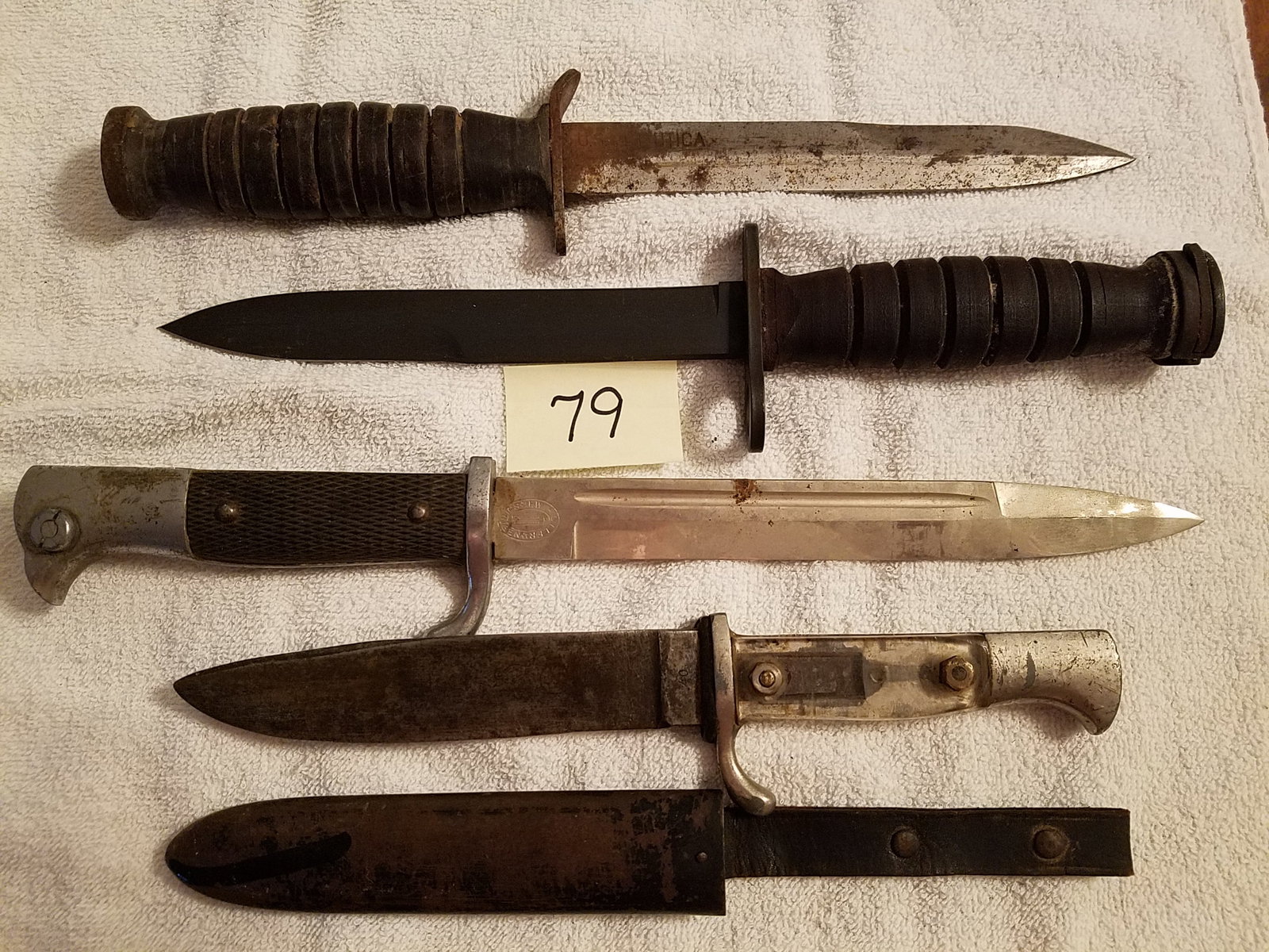 Four Military Bayonets and Knives: Four military bayonets and knives. One WWII US M3 Utica trench knife. One F.W. Holler Solingen bayonet. Two other unknown. See photos.