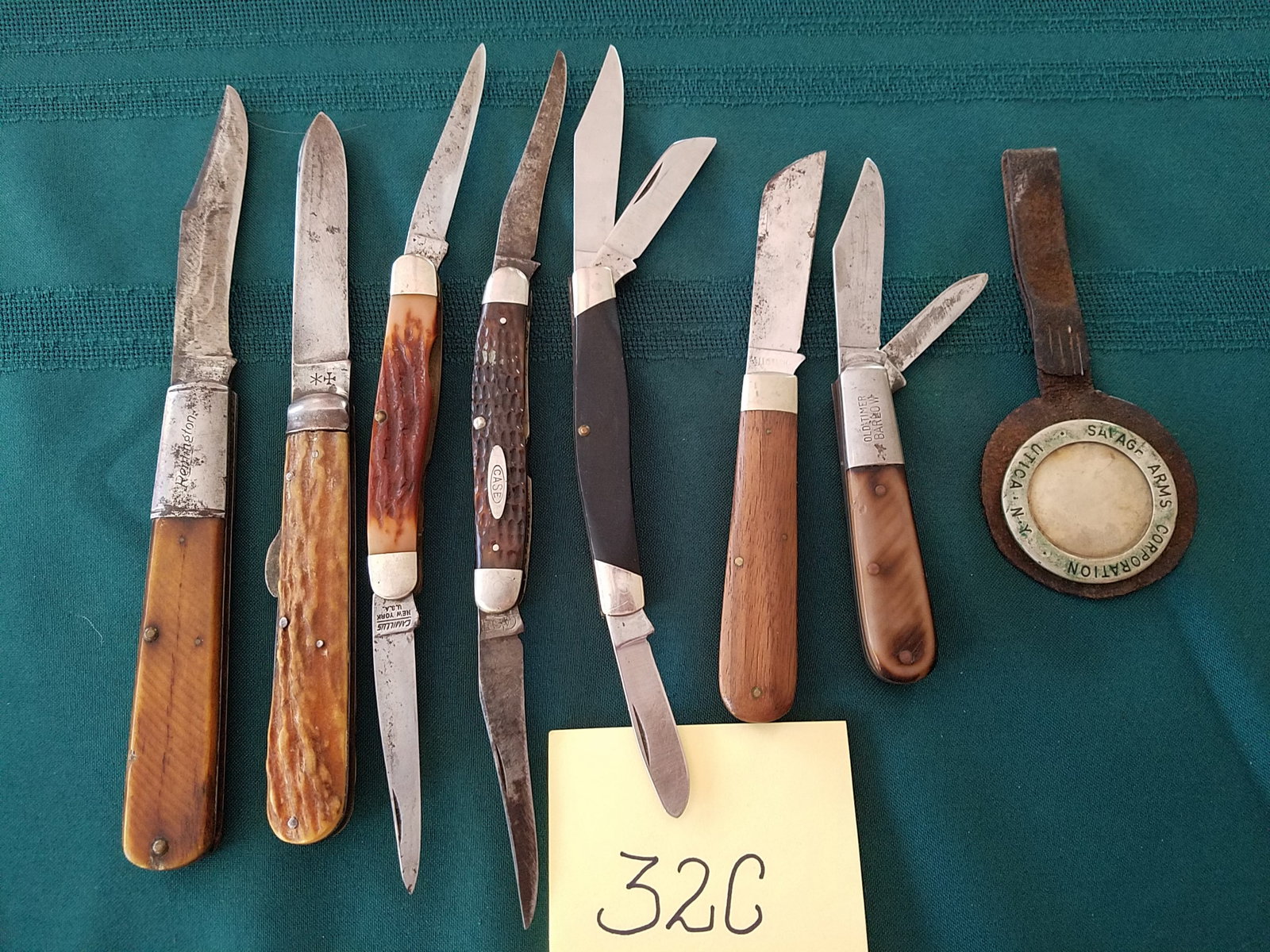 Assorted Lot of Pocket Knives: Assorted lot of pocket knives. Seven pocket knives manufactured by Joseph Rogers & Sons, Camillus, Case, Buck, Old Timer, Remington and more. Lot includes advertising badge from Savage Arms Corporatio
