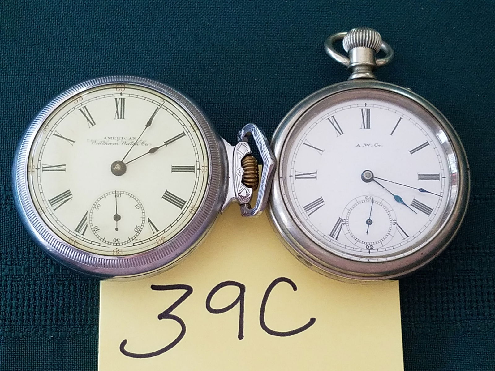 Two Silver Plated Pocket Watches: Two silver plated pocket watches. One marked A.W. Co., Waltham, MA, Bond St. One marked American Waltham Watch Company with the word Defiance on the watch case. See photos.