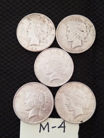 Late Listing: Five US Peace Silver Dollars