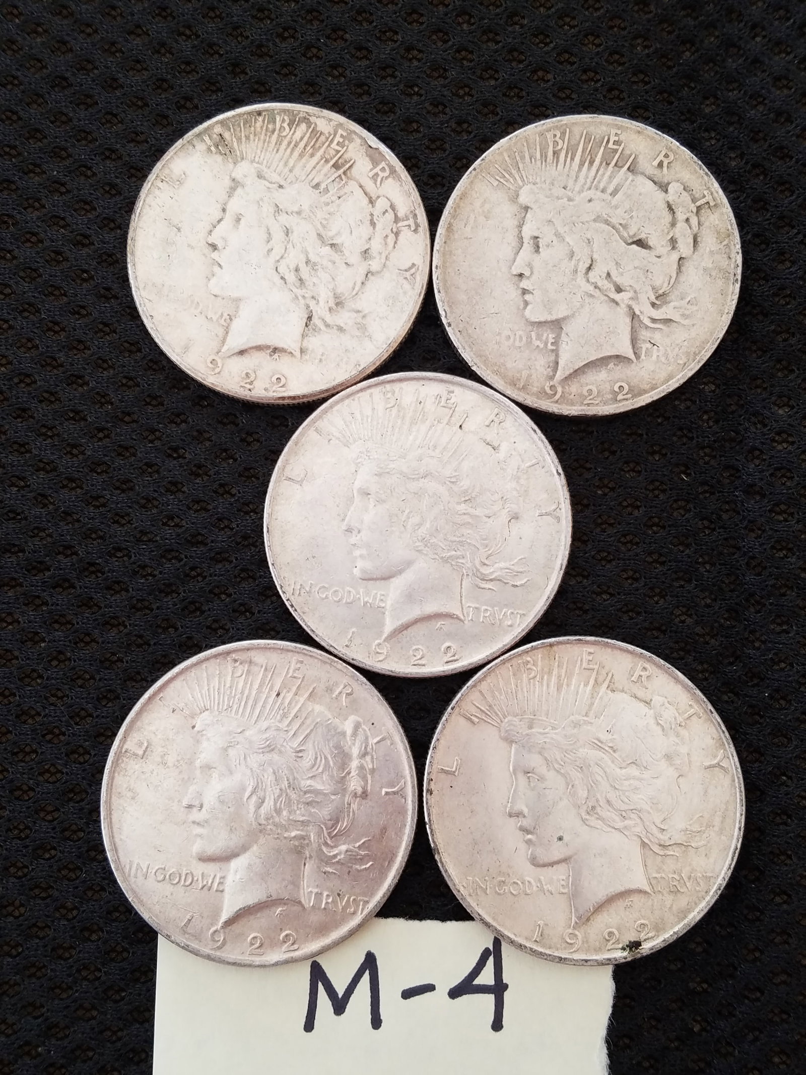 Late Listing: Five US Peace Silver Dollars: Five US Peace silver dollars. 1922, 1922, 1922, 1922 and 1922-S. See photos.
