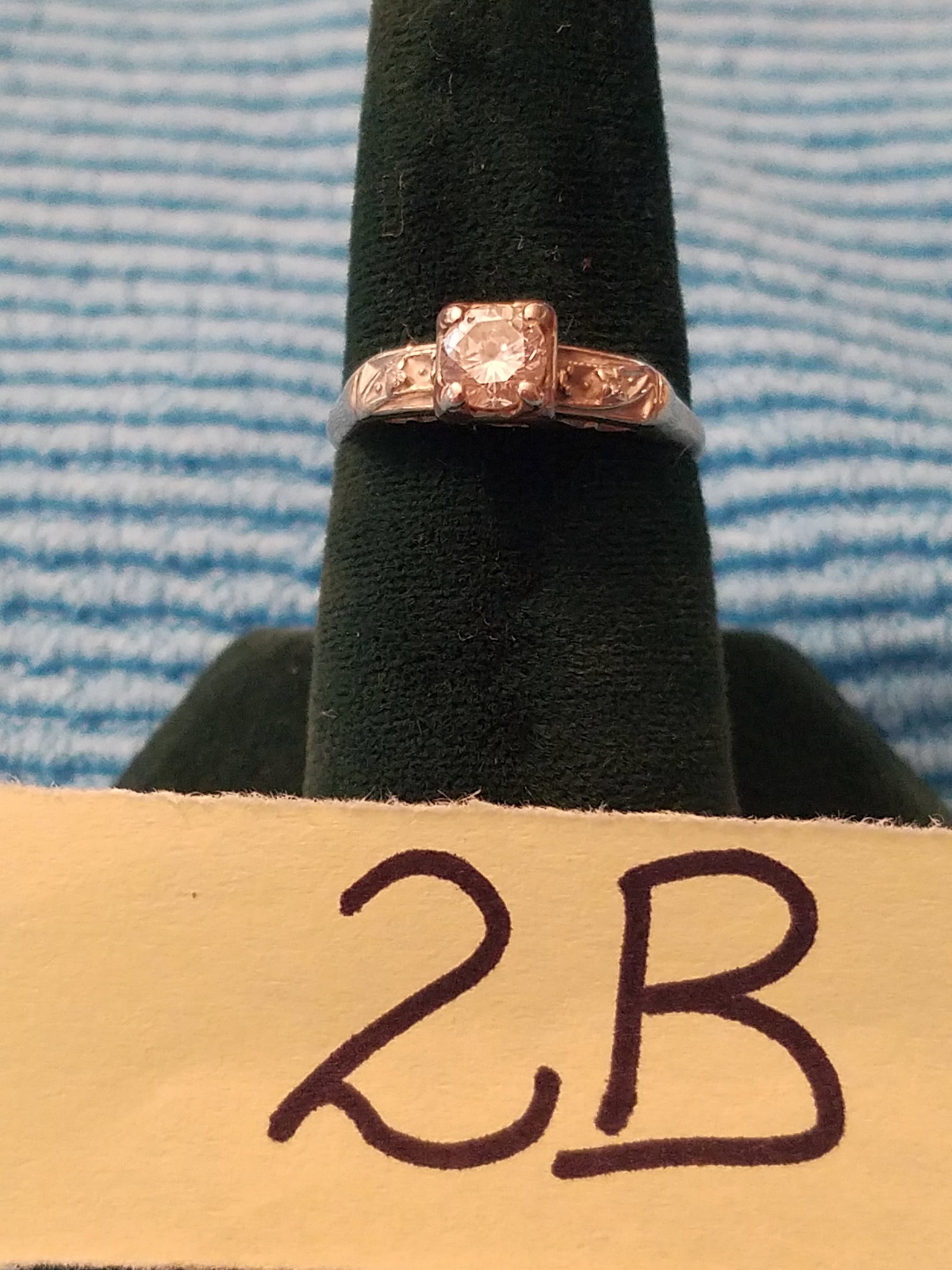 14K Gold and Diamond Ring: 14K gold and diamond ring. Diamond is estimated at 0.36 carats, old cut, with visible inclusions. Ring weighs 1.9 grams total, including the weight of the stones. See photos.