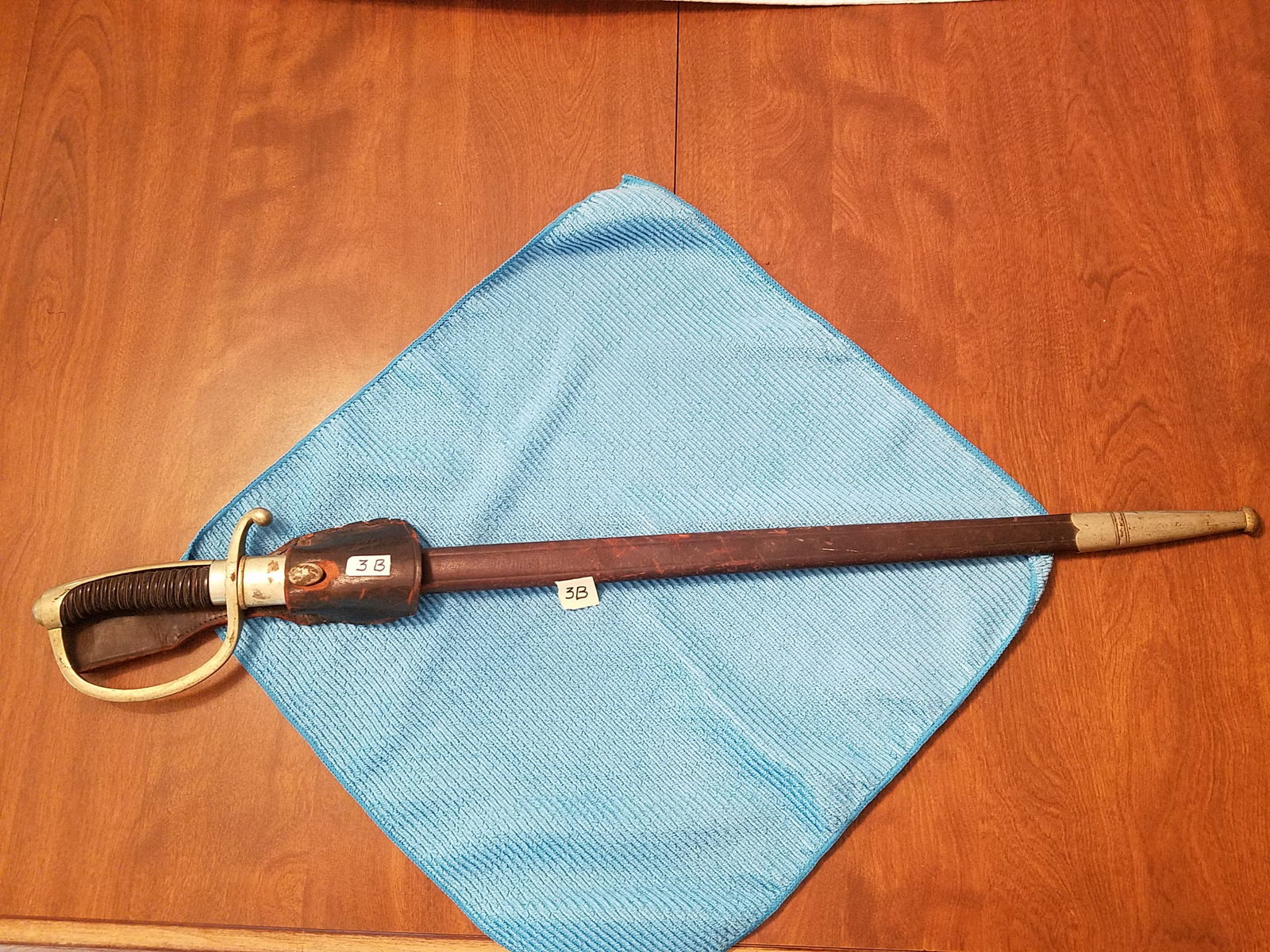 WWI Bavarian Officers Sword: WWI Bavarian Officers Sword. M1890 Artillery Officers Sword with Bakelite handle. Marked "In Treue Fest". Comes with scabbard. See photos.