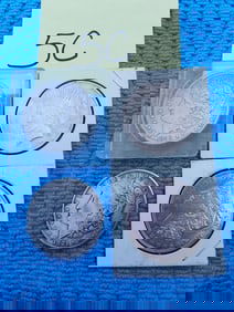 Four US Silver Dollars