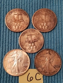 Five One Ounce Silver Coins