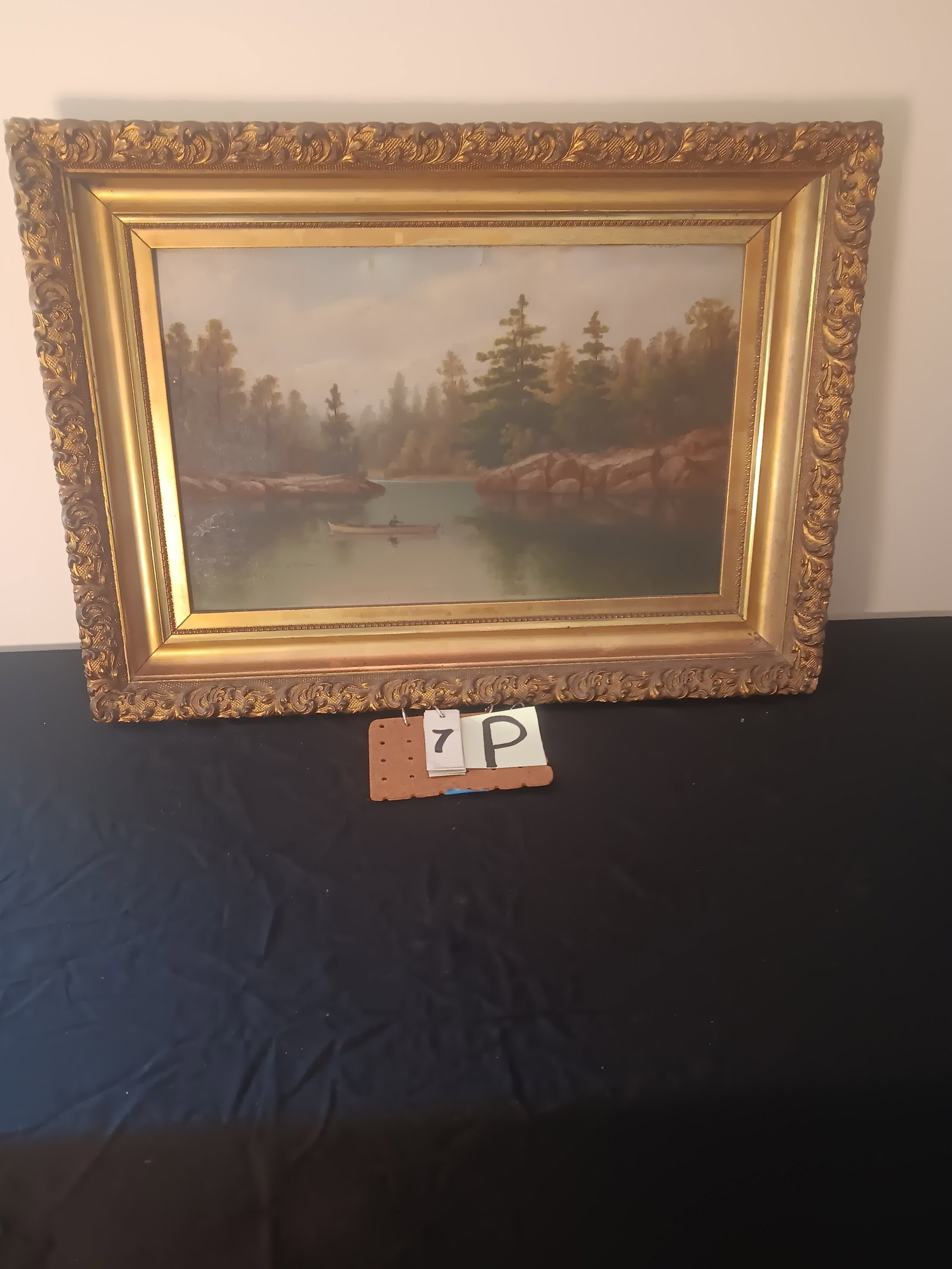 19c Oil on Board Painting of Adirondack Scene: 19th century oil on board painting of Adirondack mountain pond scene. Has guide boat with man rowing. Not signed. Frame is 28.875"w x 21"h. Painting is 21.5"w x 13.5"h. See photos. From the Dr. Thomas
