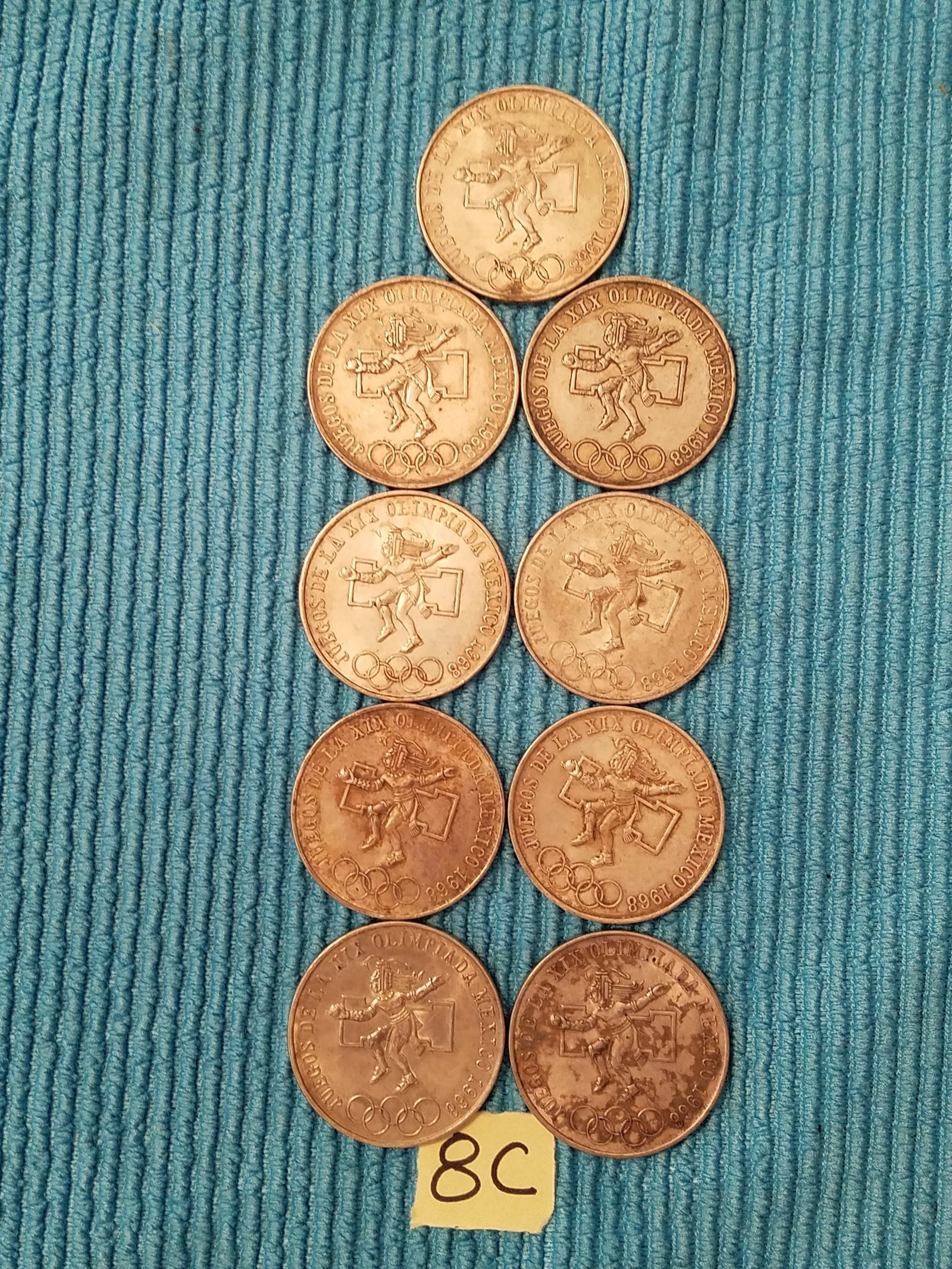 Nine 1968 Mexico Olympic Coins: Nine 1968 Mexico Olympic coins. 72% silver. See photos.