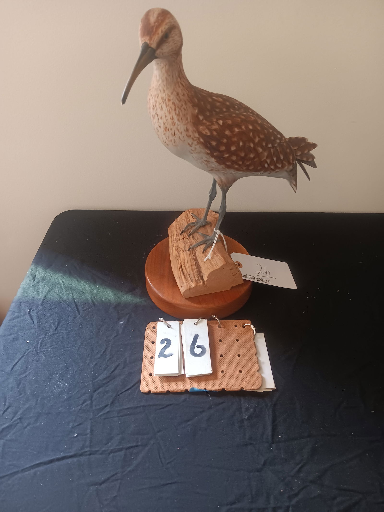 Hand Carved Wood Shorebird by Mike Wavercak: Hand carved and hand painted wood shorebird by Mike Wavercak. Some part of the nose is missing. Both legs have been broken. See photos. From the Dr. Thomas Fallon Collection.