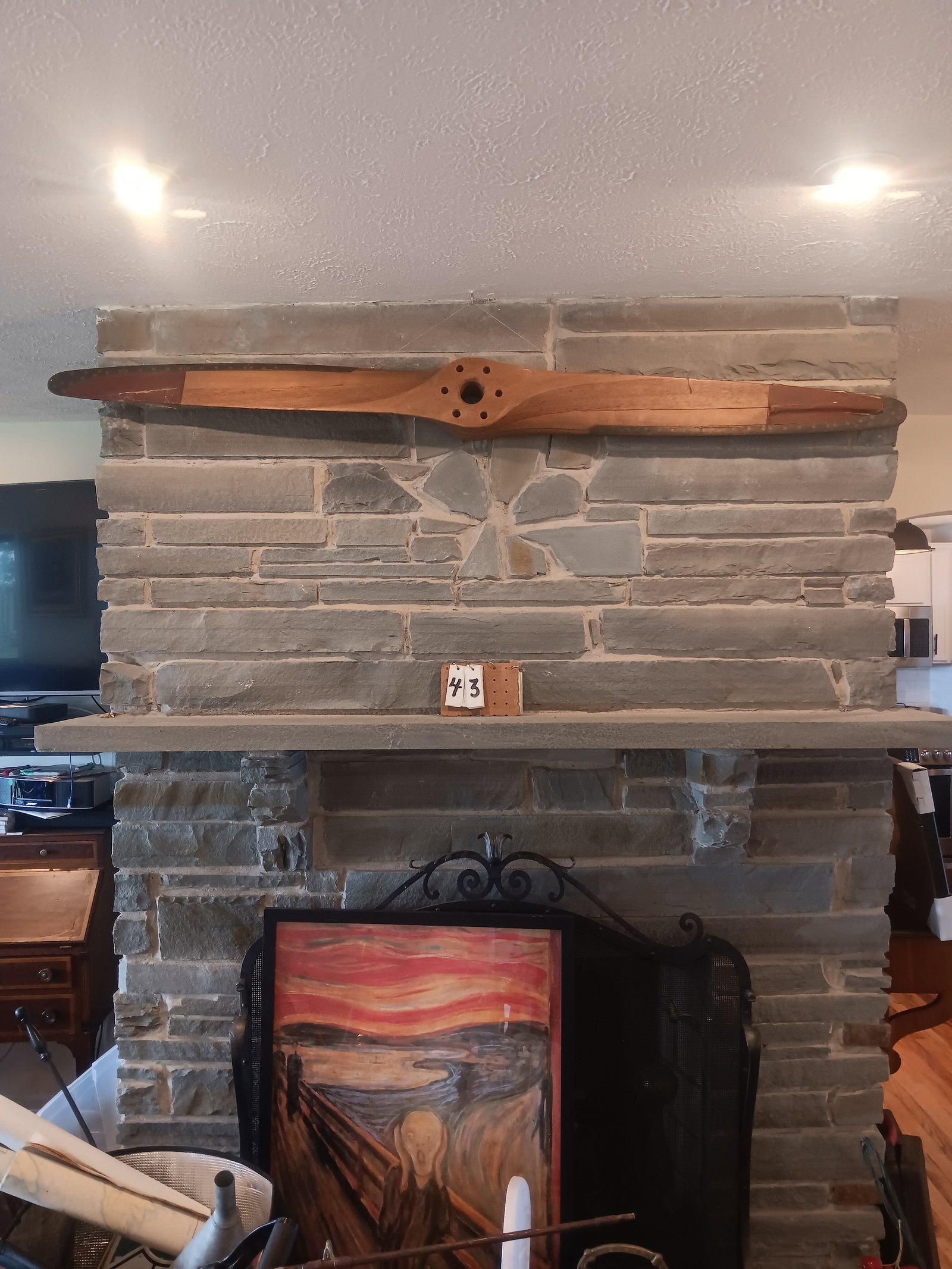 Early 1900s Wood and Metal Airplane Propeller: Early 1900s wood and metal airplane propeller with brass and fabric edging. #35607. Has a crack in one of the blades. 70"l x 4"d. See photos. From the Dr. Thomas Fallon Collection.