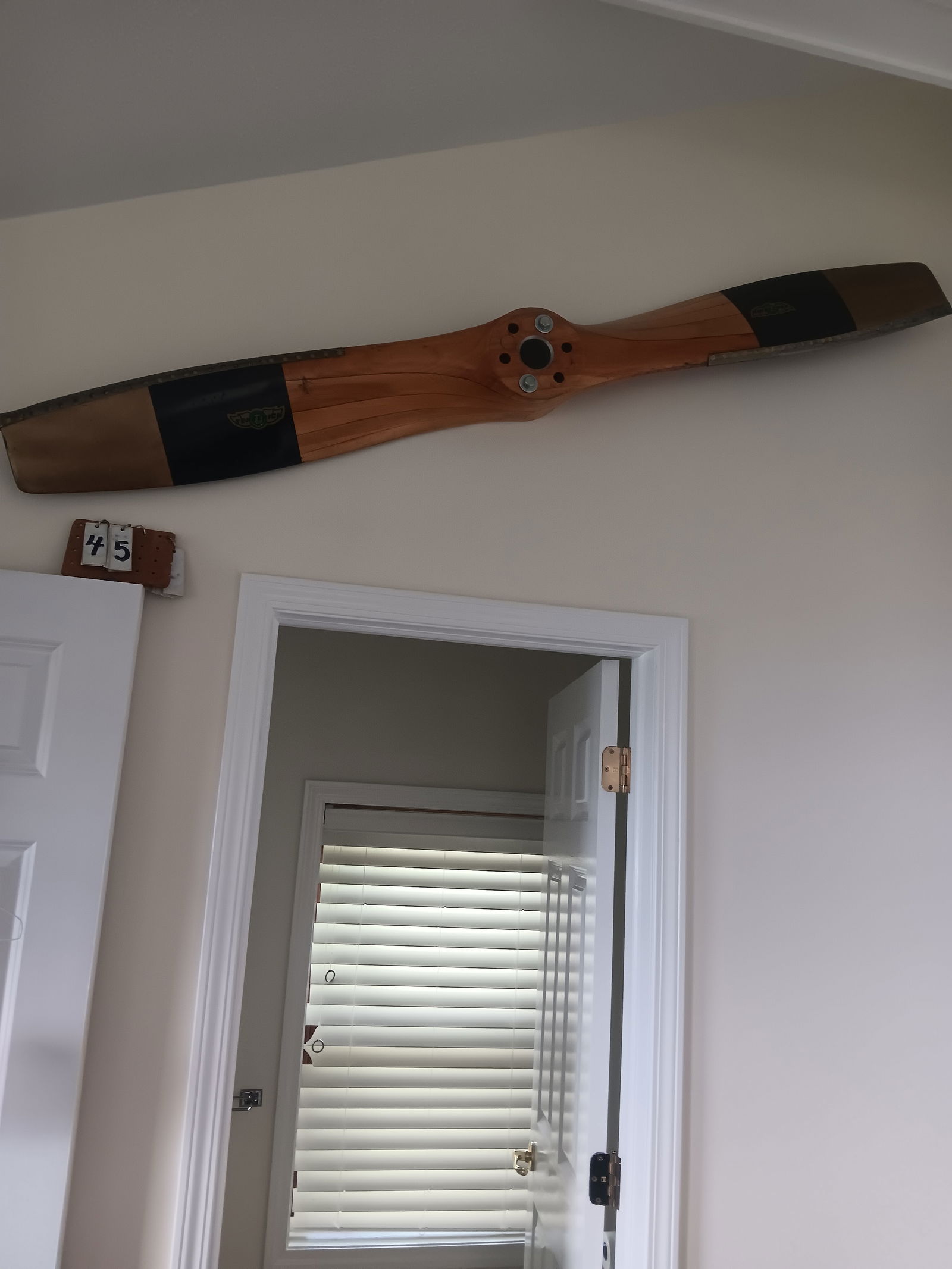 Antique Sensenich Wood and Metal Airplane Propellers: Antique Sensenich wood and metal airplane propellers in excellent condition. 72"l x 4.5"d. See photos. From the Dr. Thomas Fallon Collection.