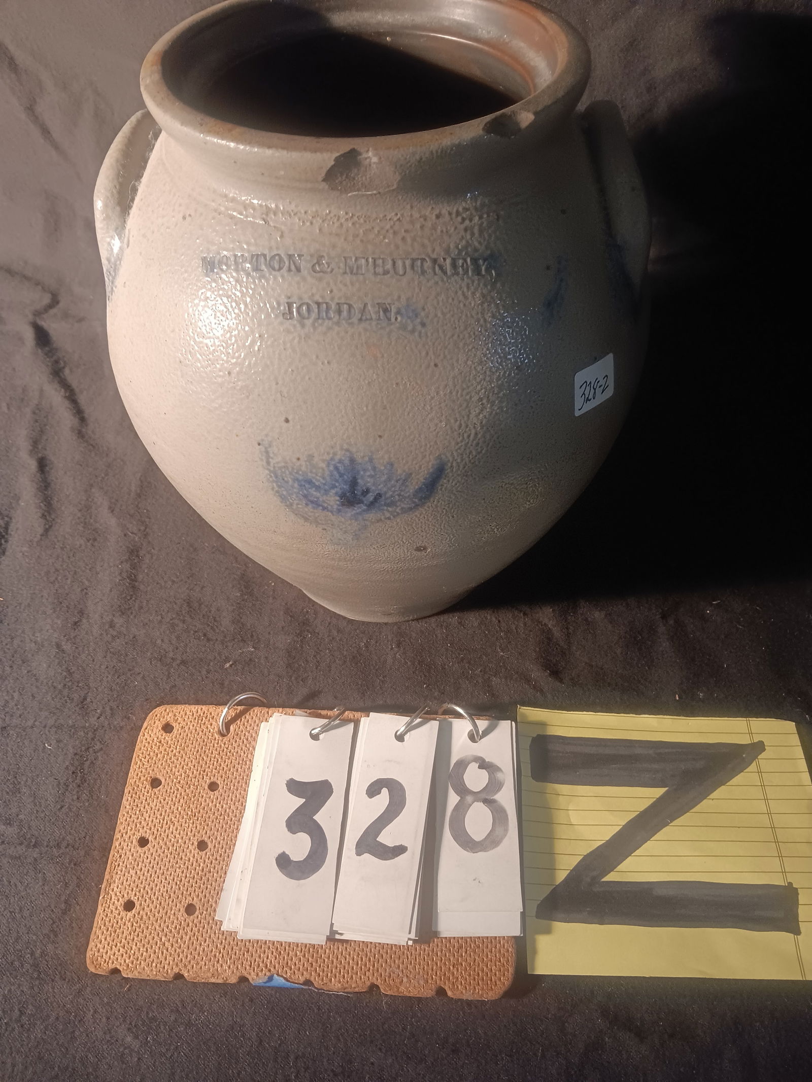 Jordan, NY M. Burney Ovoid Crock: Jordan, NY M. Burney ovoid stoneware crock. Has three rim chips on the top front. 8" dia. x 10"h. See photos. From the Fairmont, NY estate of Carrie Gannett, and advanced antique, art and jewelry coll