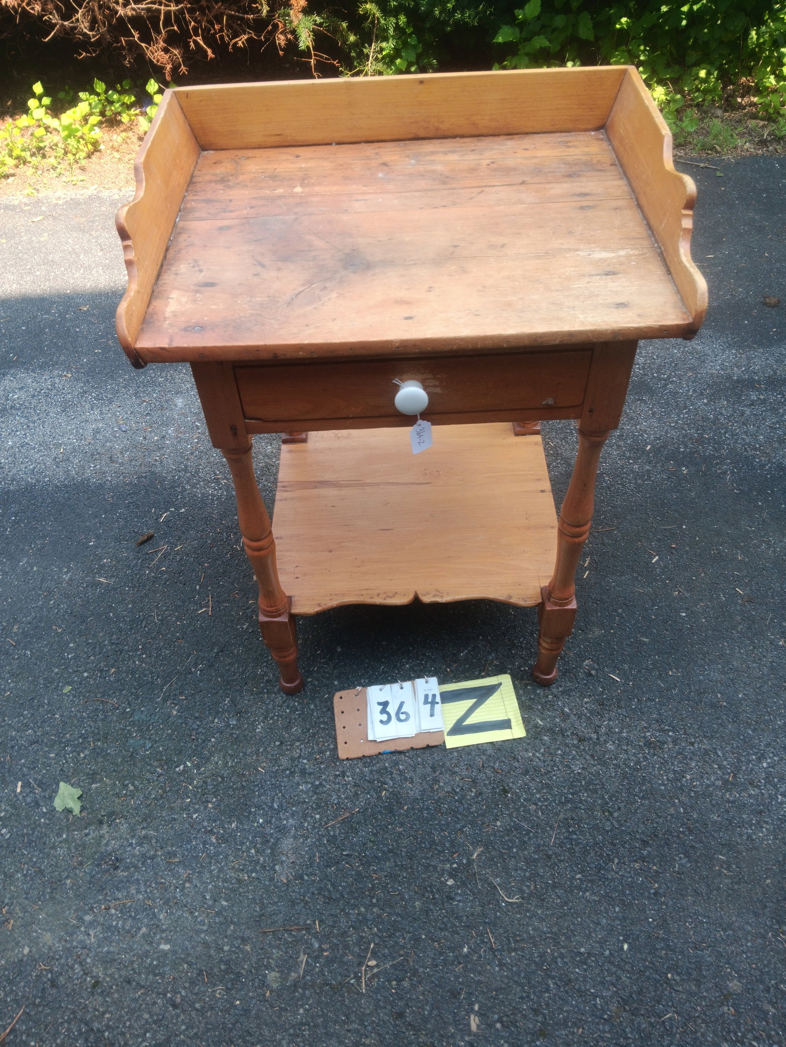 1830s American One Drawer Stand: 1830s American one drawer stand. 24.125"w x 18.75"d x 31"h. See photos. From the Fairmont, NY estate of Carrie Gannett, and advanced antique, art and jewelry collector.
