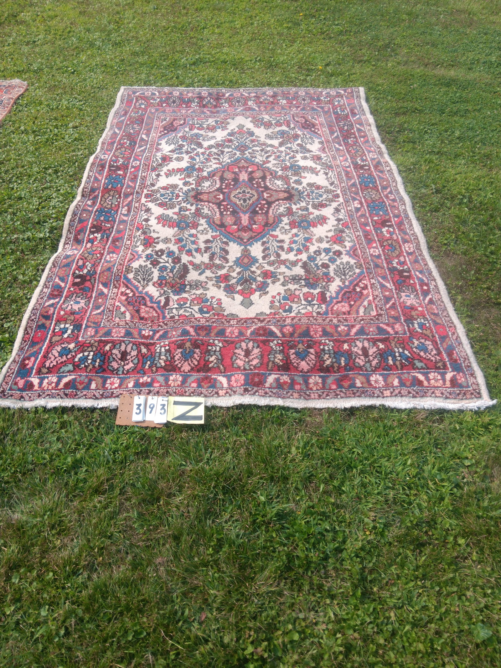 Room Size Persian Oriental Rug: Room size Persian Oriental rug. 70.5"w x 114"l. See photos. From the Fairmont, NY estate of Carrie Gannett, and advanced antique, art and jewelry collector.