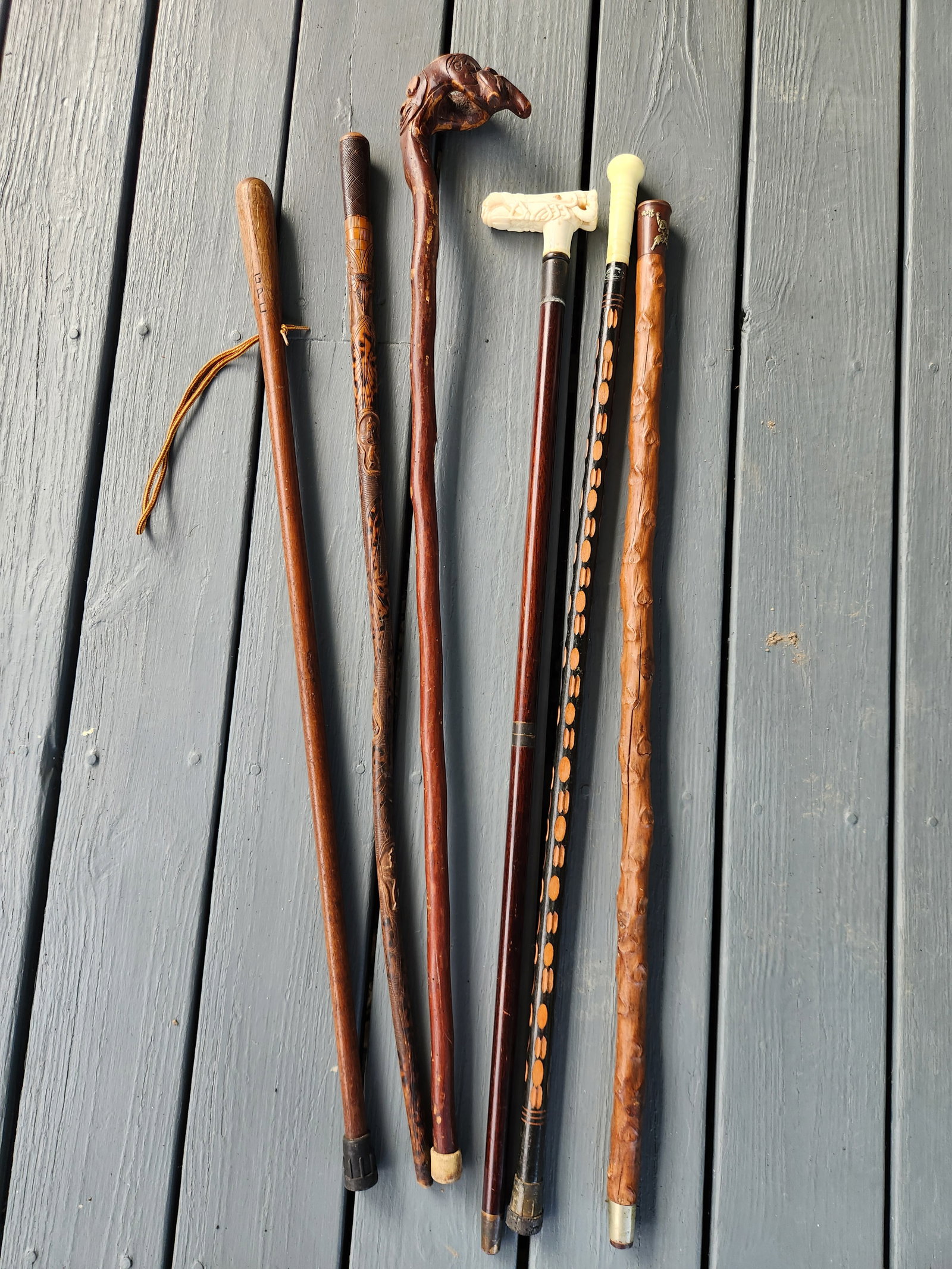 Six Miscellaneous Vintage Carved Canes: Six miscellaneous vintage carved canes. Roughly 36"l x 4"w x 2"d. See photos.
