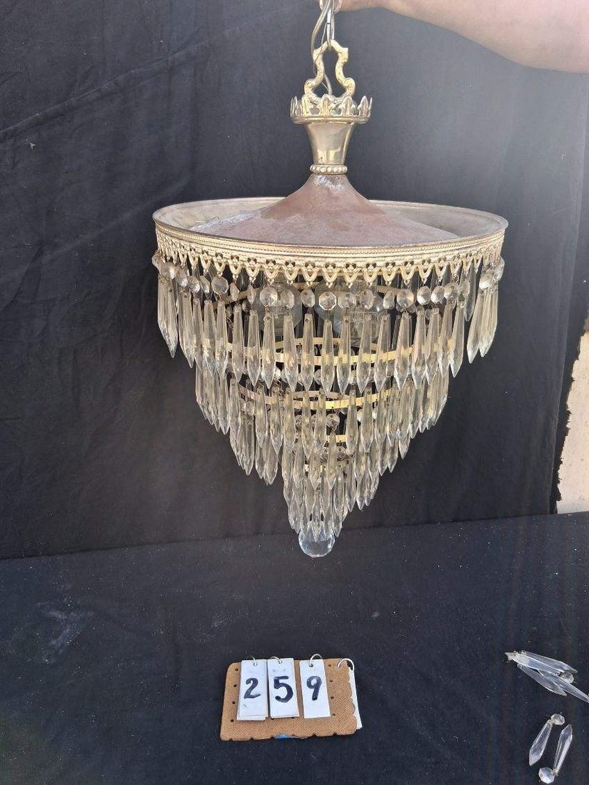 1920s Silver over Brass Chandelier with Cut Glass Prisms: 1920s silver over brass chandelier with cut glass prisms. Some prisms are missing. 150+ prisms. 15"l x 15"w x 34"h. See photos. From the Dr. Thomas Fallon Collection.