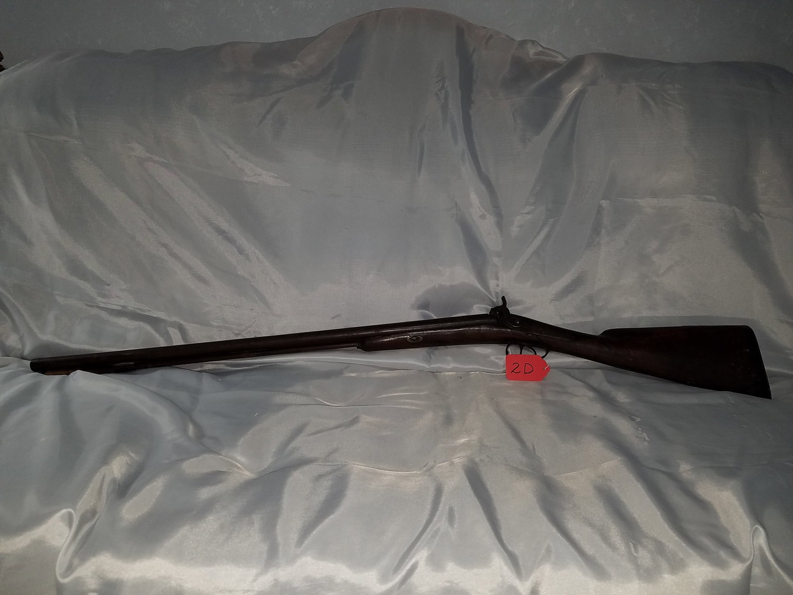 Mortimer Double Barrel SxS Muzzeloader: Mortimer double barrel side by side muzzeloader. THIS IS A WALL HANGER ONLY - NOT TO BE FIRED. Broken stock and ram rod holder and has barrel repairs. See photos.