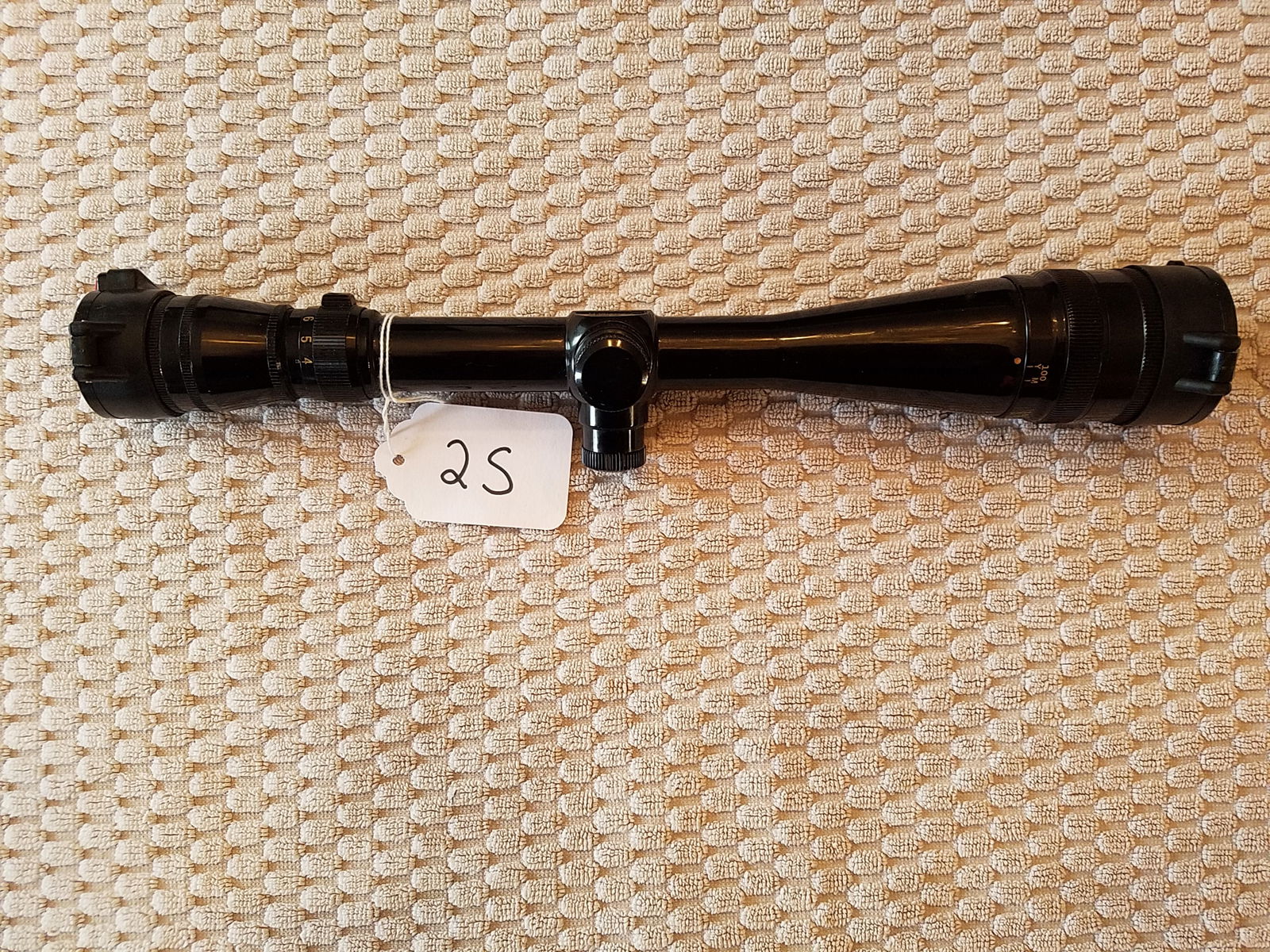 Redfield 4X-12X Scope: Redfield 4X-12X scope. Duplex reticle. Has Butler Creek flip up scope caps. See photos.