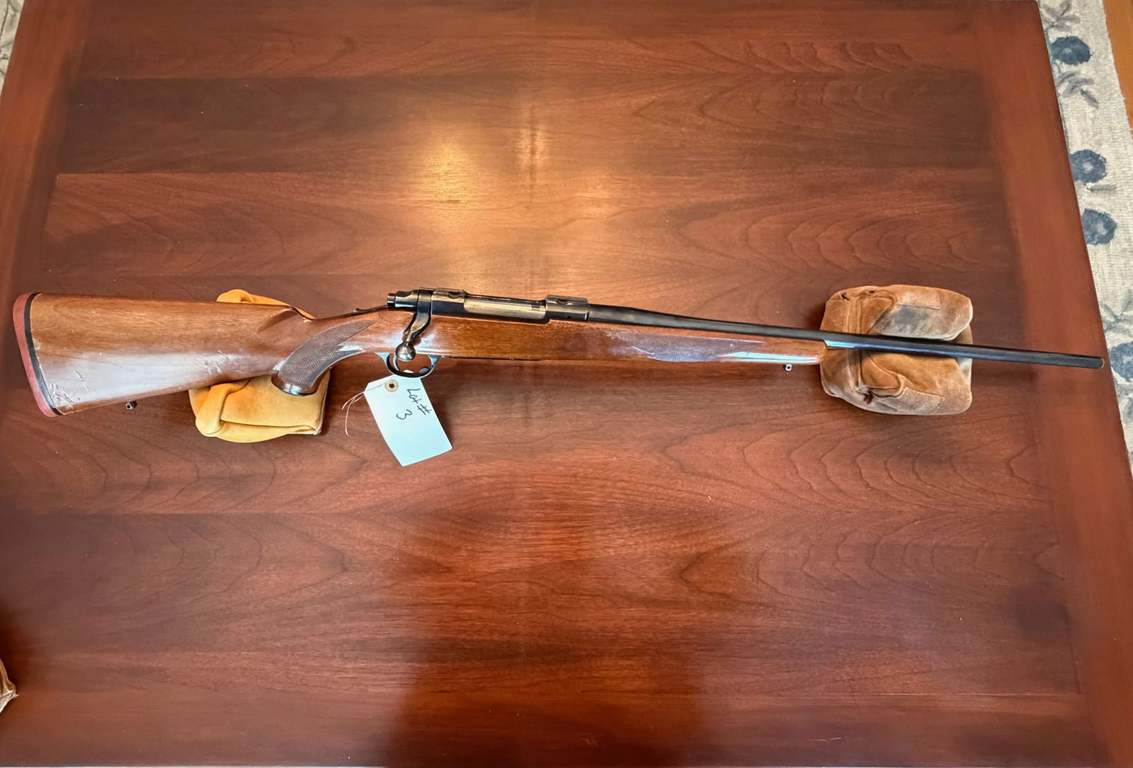 Ruger Model 77: Ruger Model 77. 7mm Remington Magnum. 24" barrel. Minor scratches on the magazine floor plate and trigger guard. Serial No. 78-75345. See photos.