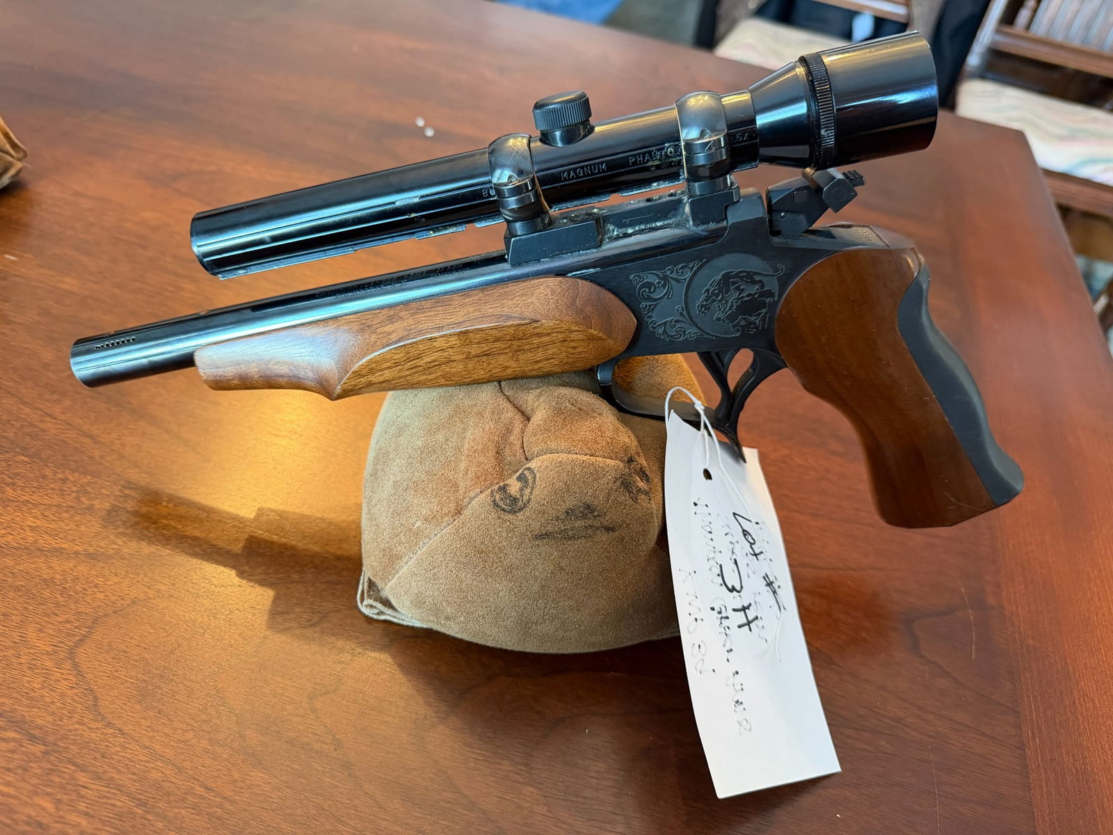 Thompson Center Contender: Thompson Center Contender. 35 Remington. 10" barrel. Bushnell Magnum Phantom 2.5x scope. Serial No. 144666. See photos.