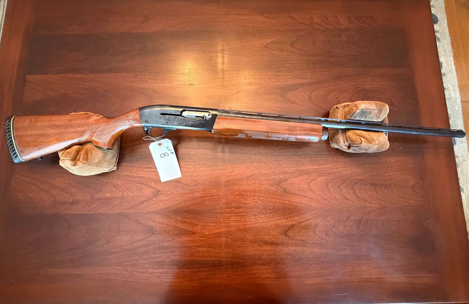 Remington Model 1100: Remington Model 1100. 20 gauge. 2.75" shells only. 26" vent rib full choke barrel. Serial No. L082760X. See photos.
