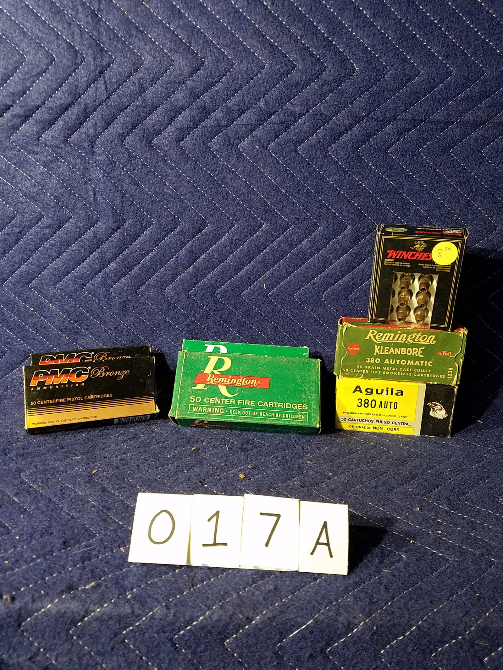 380 Auto Ammo: 380 Auto ammunition. Two boxes of Remington, 95 grain metal case (120 rounds). One box of PMC, 90 grain FMJ (66 rounds). One box of Aguila, 95 grain jacketed (50 rounds). One box of Winchester, 95