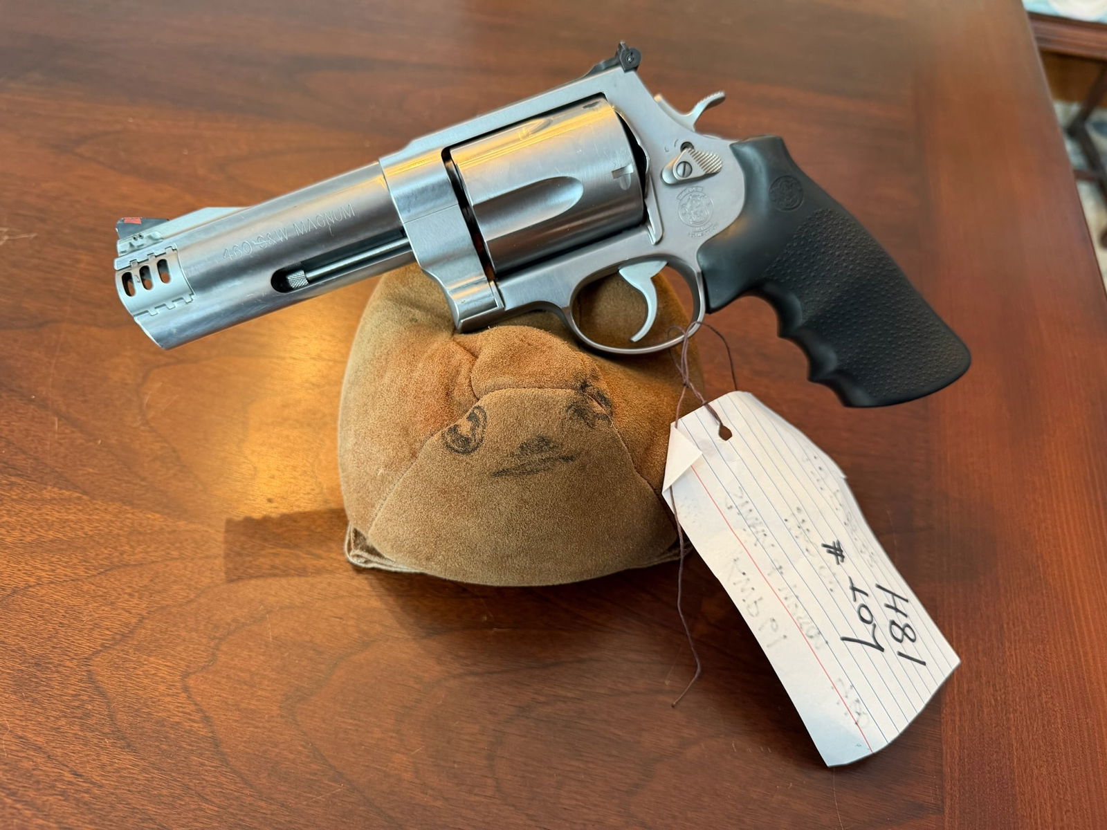 Smith & Wesson Model 460: Smith & Wesson Model 460XVR. 460 Smith & Wesson. Has 5" barrel. Has cylinder drag line. Comes with original 8" barrel, top rail, scope mount, additional compensators and original carry case. Serial