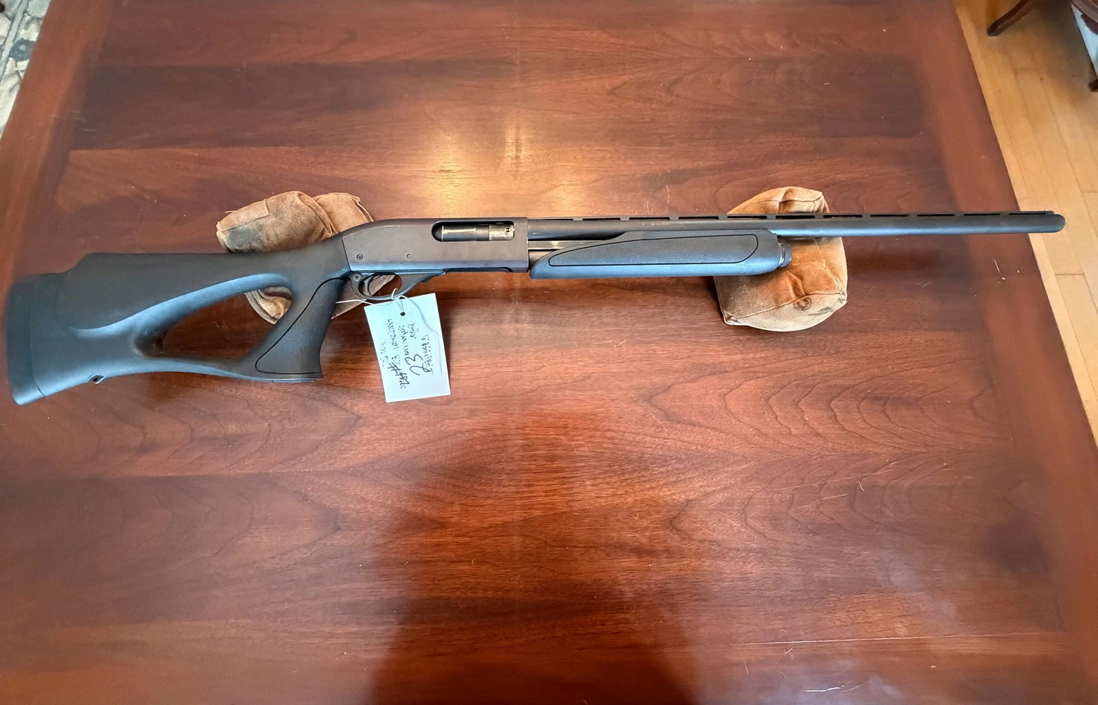 Remington 870 Express Super Magnum: Remington 870 Express Super Magnum. 12 gauge. 2.75", 3" or 3.5" shells. 26" vent rib barrel. Factory Remington thumbhole stock. Remington full choke tube. Serial No. C899484A. See photos.