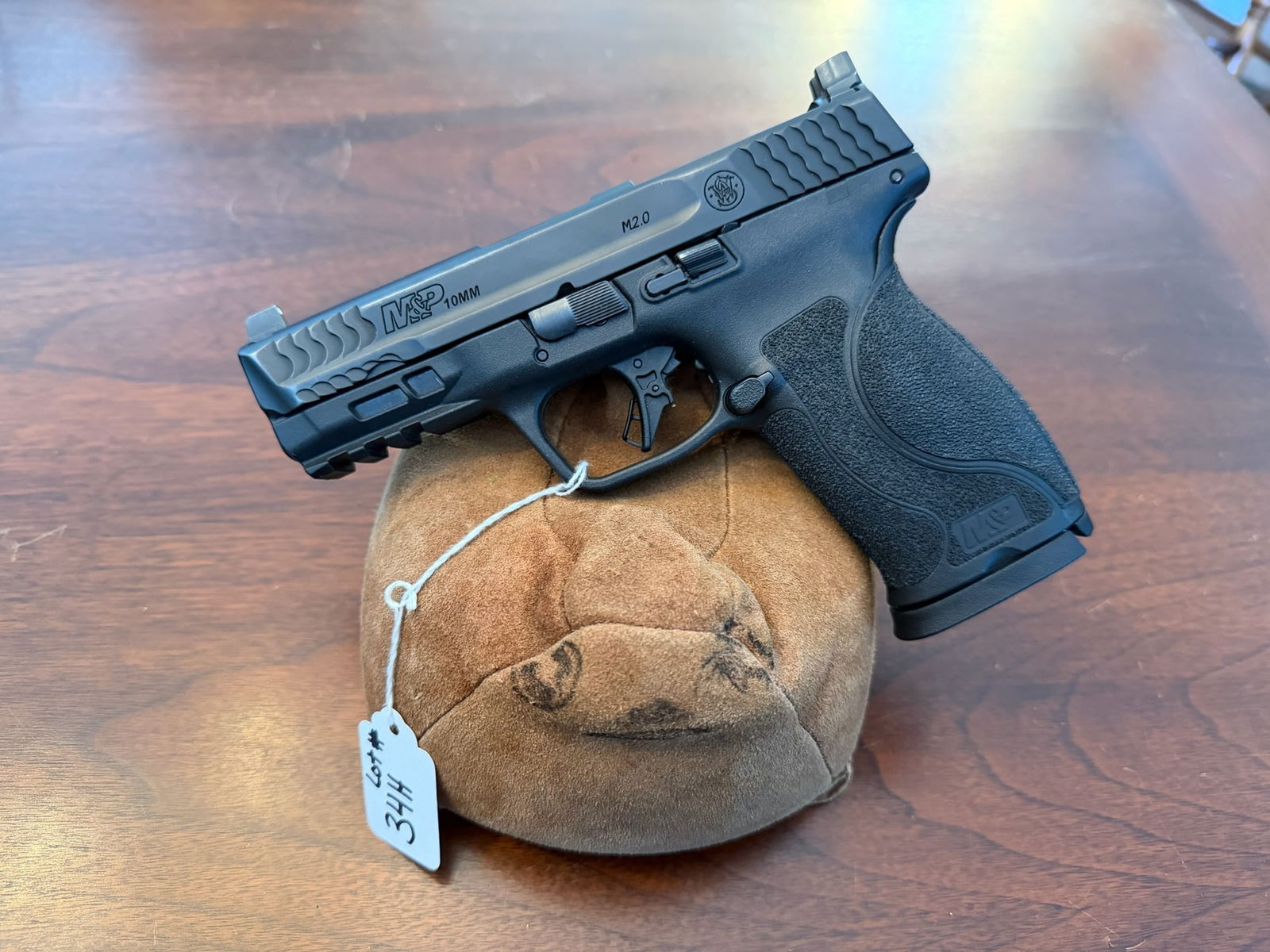 Smith & Wesson M&P M2.0: Smith & Wesson M&P M2.0. 10mm. Three additional grips. Plate mounts for optic. Serial No. NMF3068. See photos.