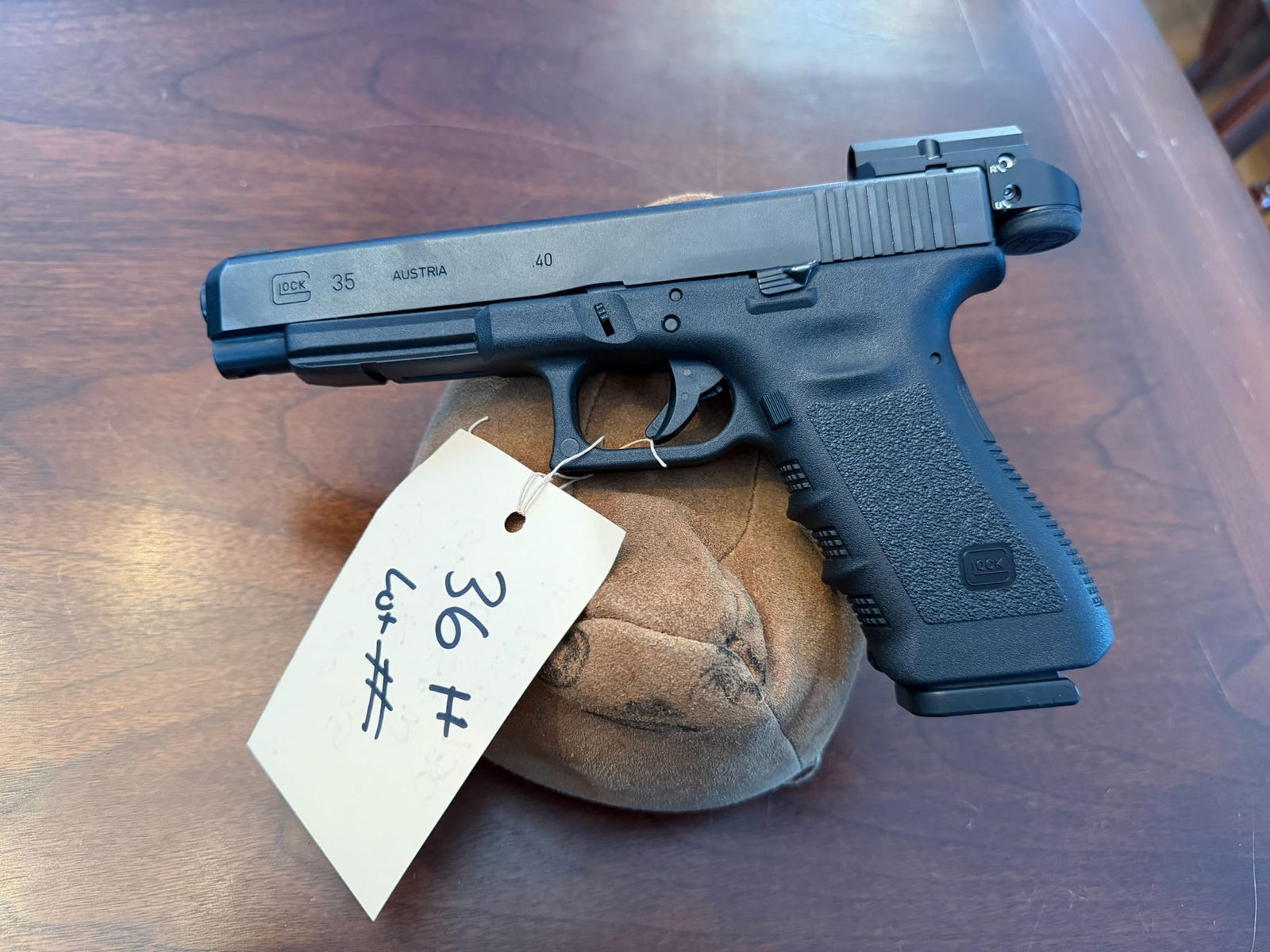 Glock Model 35: Glock Model 35. 40 Smith & Wesson. Leupold DeltaPoint red dot. Serial No. MTP730. See photos.