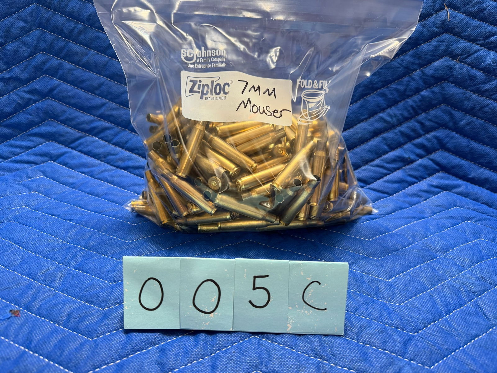 7mm Mauser Brass: 7mm Mauser brass casings, once fired. 4.2 pounds total. Approximately 42 casings per pound. See photos.