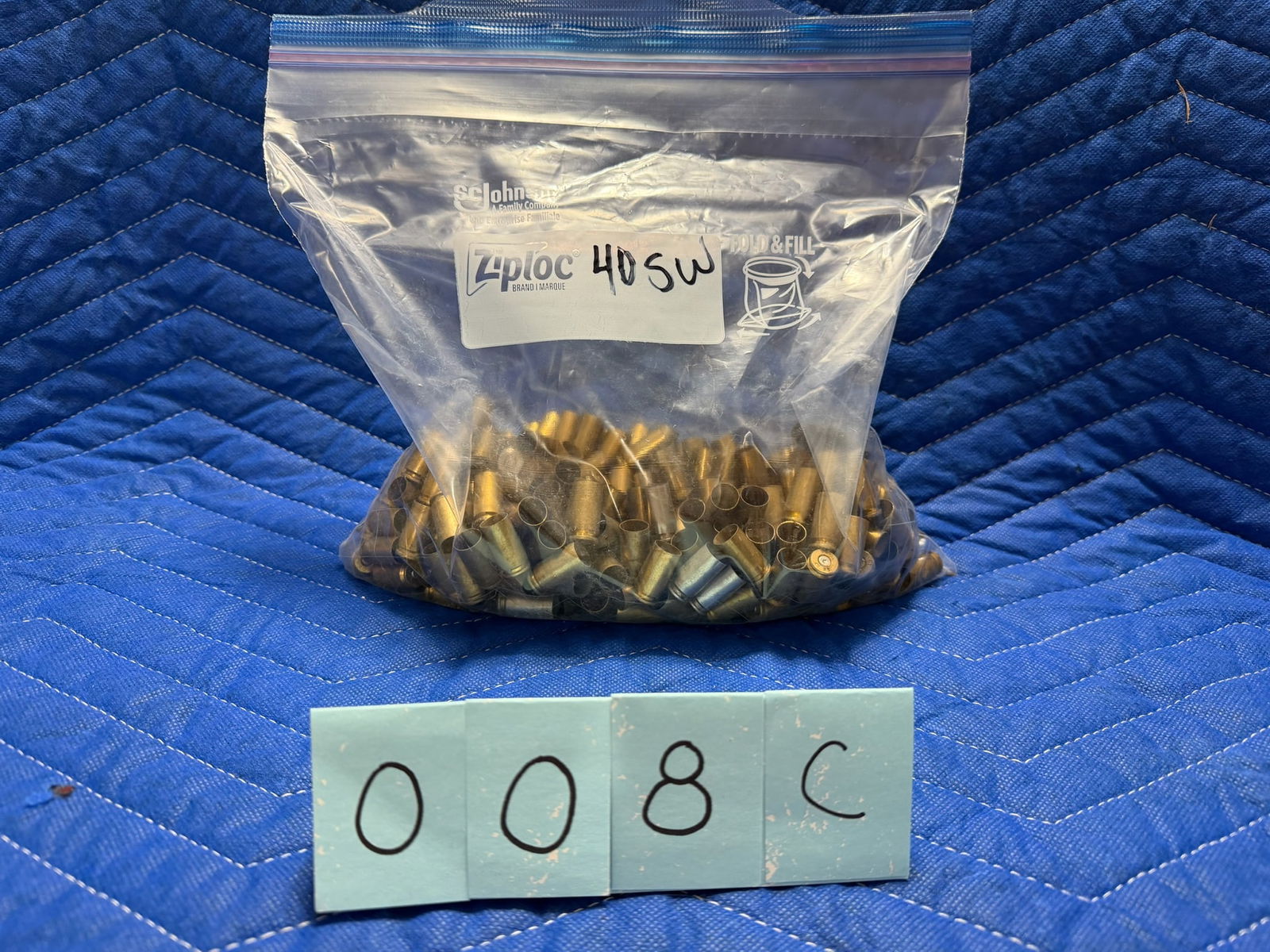 40 Smith & Wesson Brass: 40 Smith & Wesson brass casings, once fired. 2.8 pounds total. Approximately 100 casings per pound. See photos.