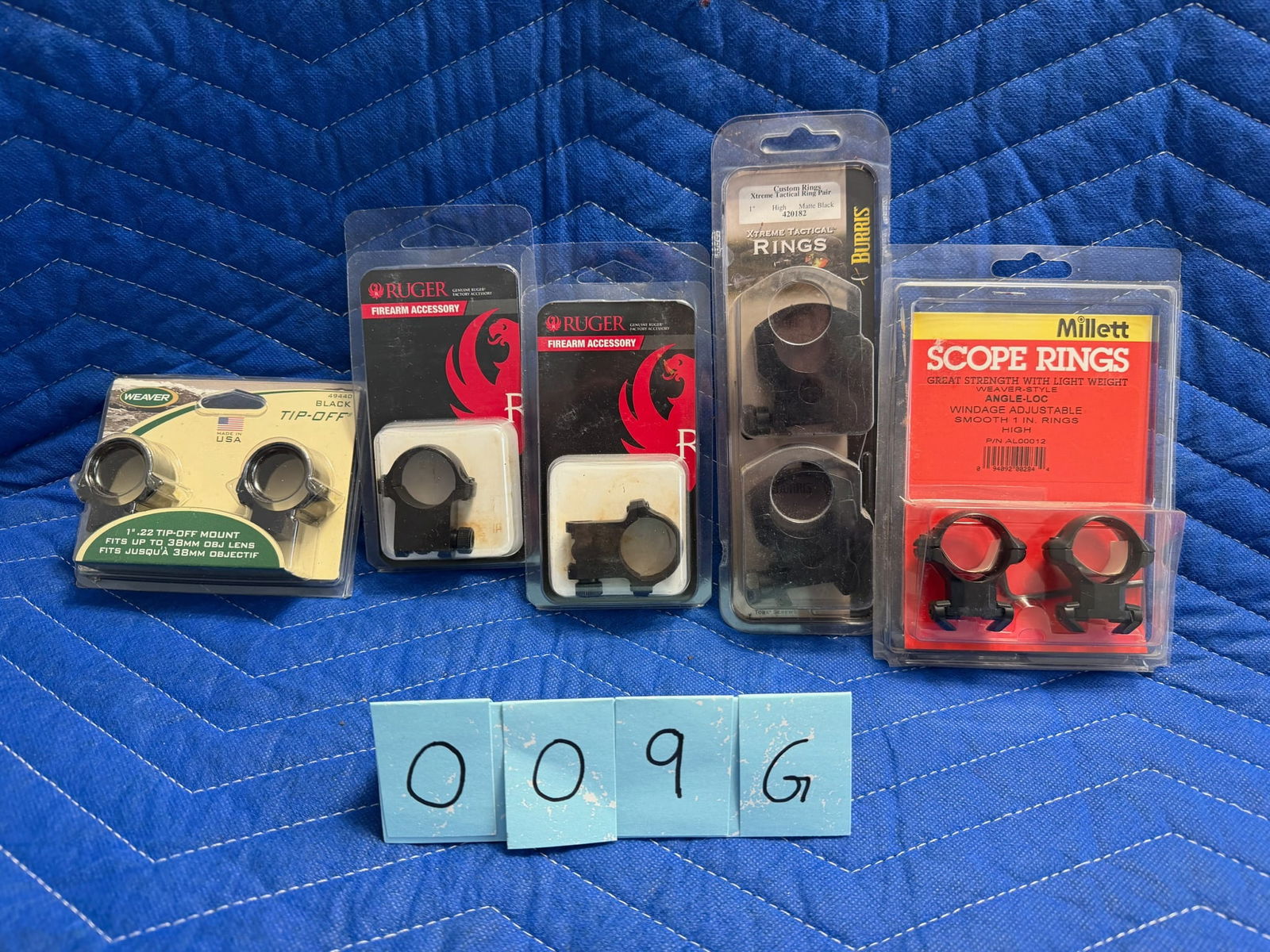 Assorted Scope Rings: Assorted scope rings. New Ruger scope rings, Part No. KS100R. Two new Ruger scope rings, Part No. 6BHM. New Millett scope rings, one inch tube, high extension, windage adjustable, Part No. AL00012.