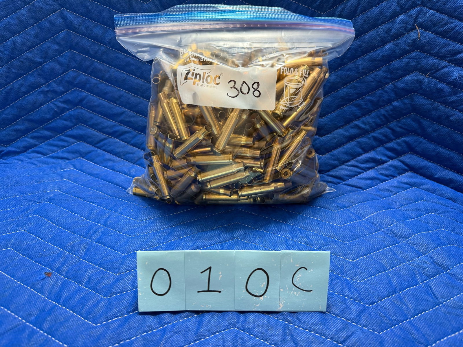 308 Winchester Brass: 308 Winchester brass casings, once fired. 8.8 pounds total. Approximately 38 casings per pound. See photos.