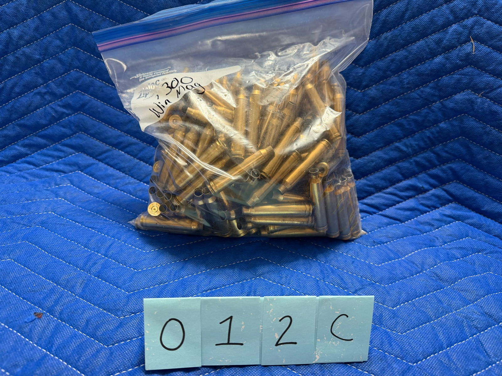 300 Winchester Magnum Brass: 300 Winchester Magnum brass casings, once fired. Roughly 50% has been deprimed. 7.0 pounds total. Approximately 29 casings per pound. See photos.