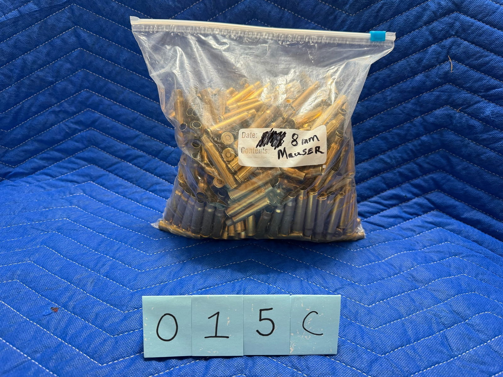8mm Mauser Brass: 8mm Mauser brass casings, once fired. 7.4 pounds total. Approximately 65 casings per pound. See photos.