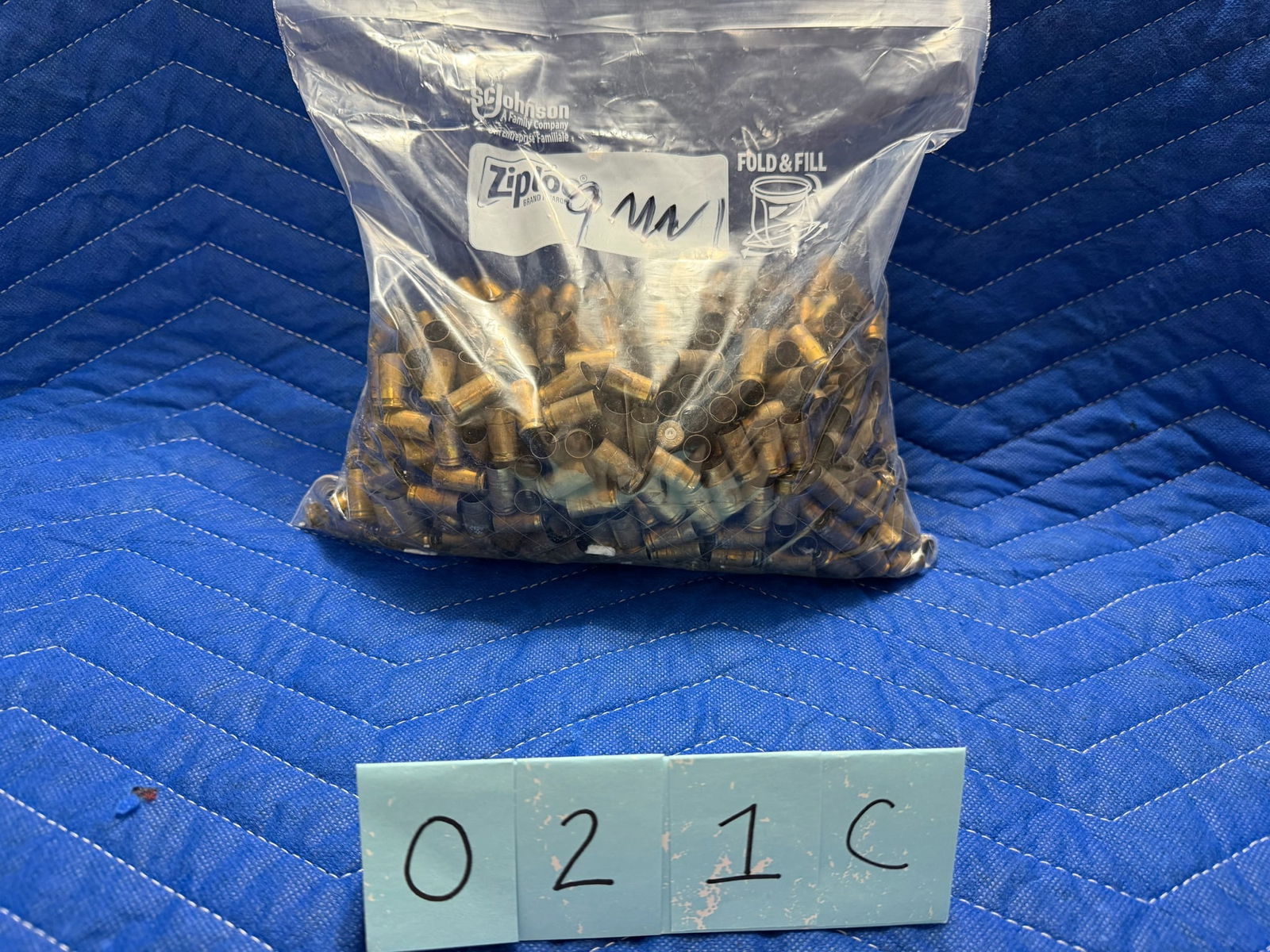 9mm Brass: 9mm brass casings, once fired. 6.2 pounds total. Approximately 113 casings per pound. See photos.