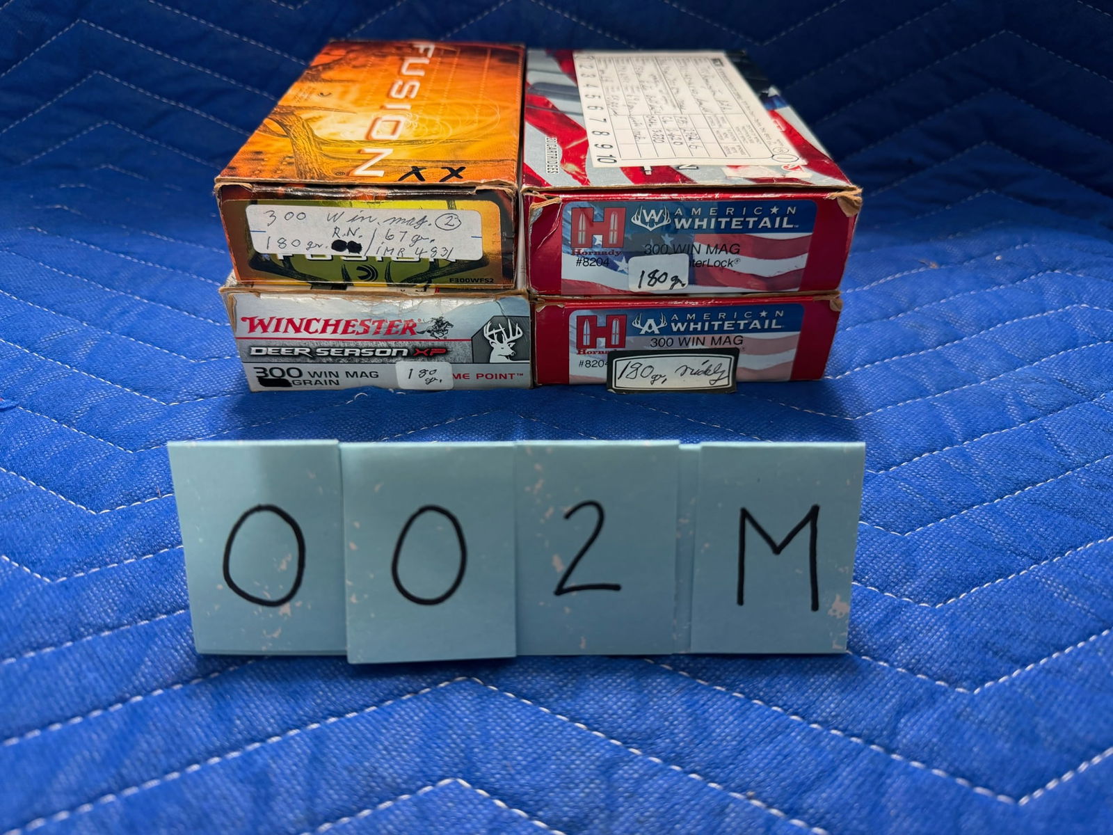 300 Winchester Magnum Ammo: 300 Winchester Magnum ammunition. Four boxes of reloads. 180 grain. 75 rounds. See photos.