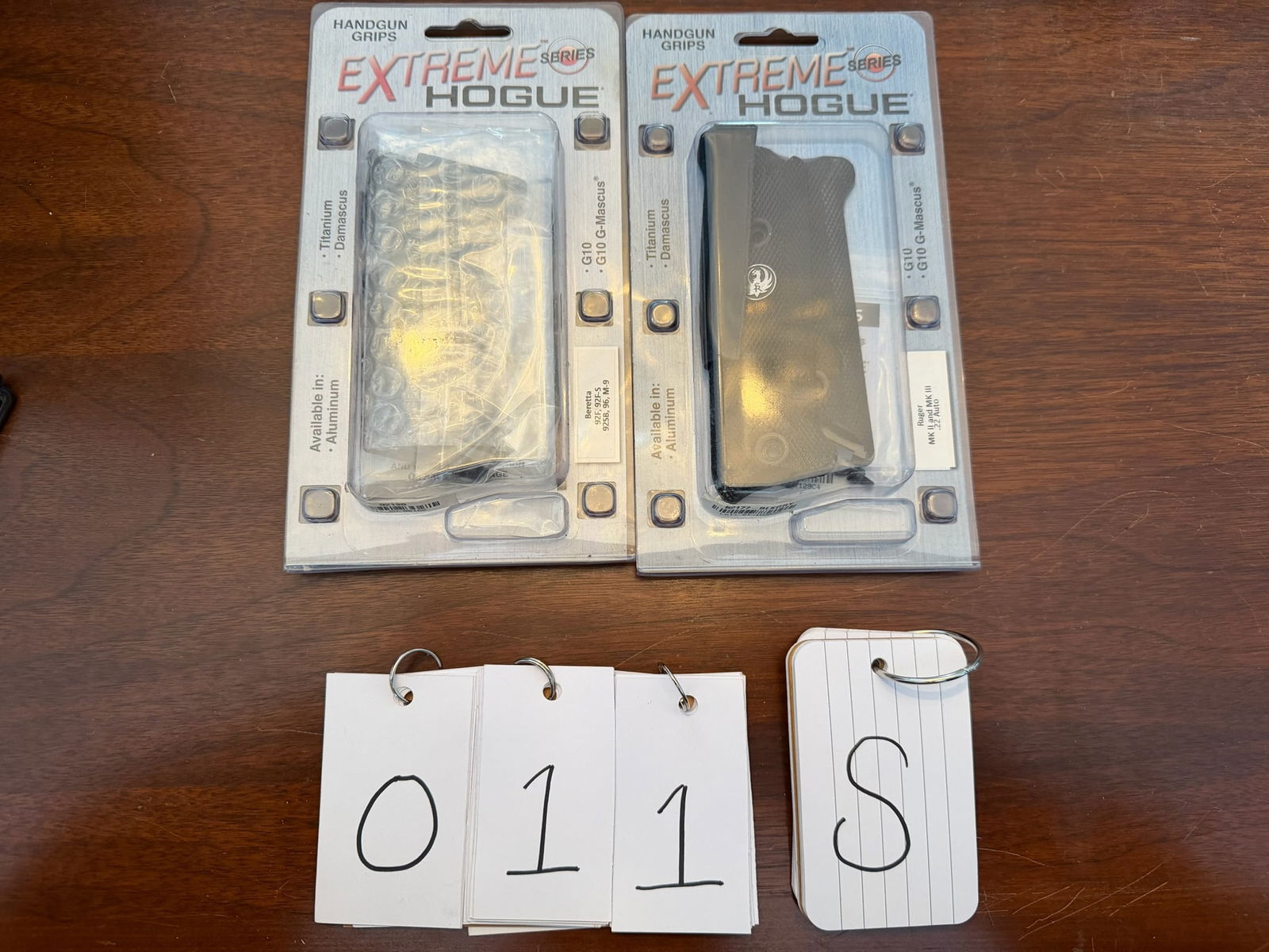 Two New Sets of Hogue Handgun Grips: Two new sets of Hogue handgun grips. One fits a Ruger MK II/III 22 Auto. One fits a Beretta Model 92F/92F-S/92SB/96/M-9. New in the packages. See photos.