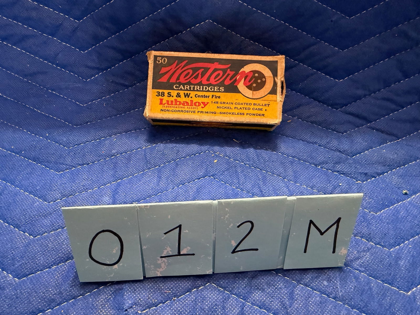 Vintage Western 38 Smith & Wesson Ammo: Vintage Western 38 Smith & Wesson ammunition. Center Fire Lubaloy. 145 grain coated bullet, nickel plated case. 35 rounds. See photos.