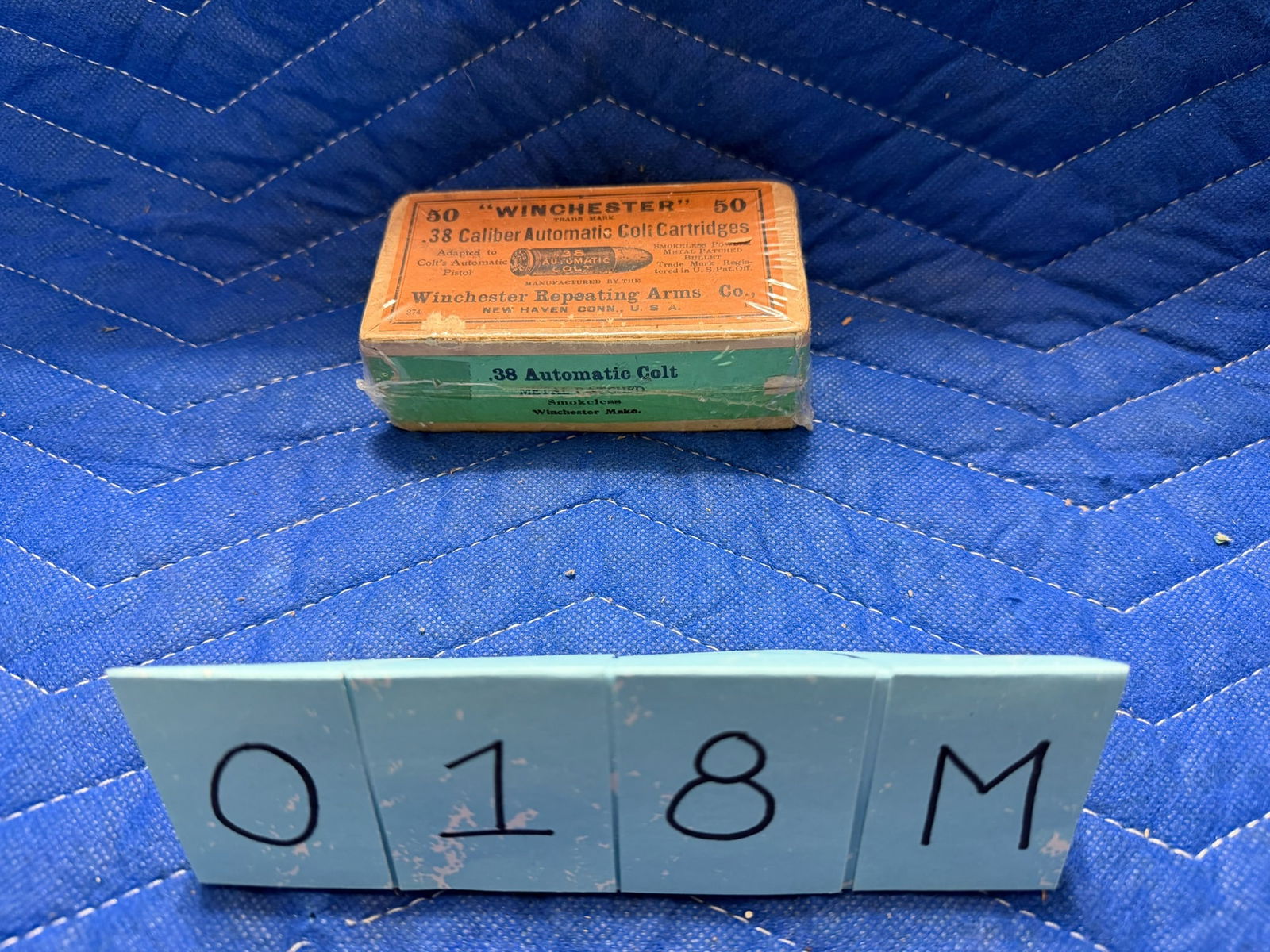 Vintage Two Part Box of Winchester 38 Automatic Colt Ammo: Vintage two part box of Winchester Repeating Arms Co. 30 caliber Automatic Colt ammunition. Smokeless powder, metal patched bullet. 50 rounds. SEALED IN THE CELLOPHANE. See photos.