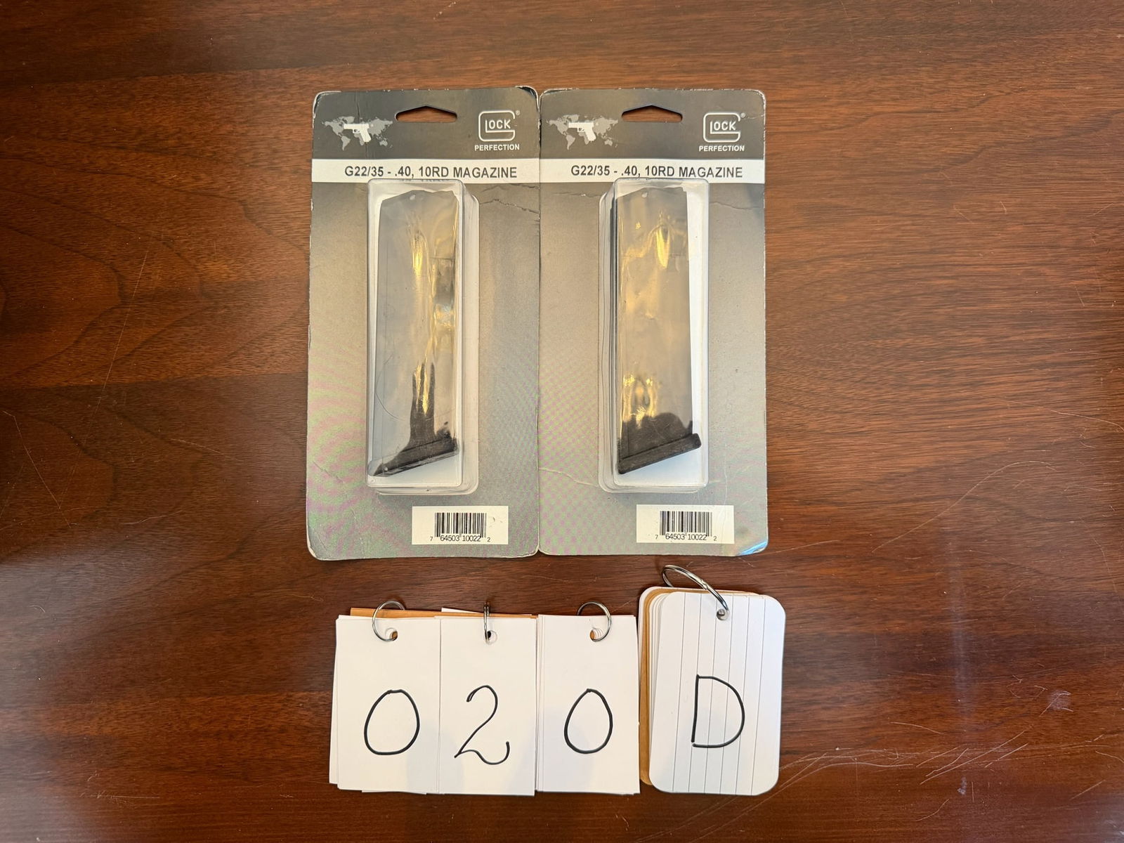 Two New Glock Model 22/35 Magazines: Two new Glock Model 22/35 magazines. 40 caliber, ten round. See photos.