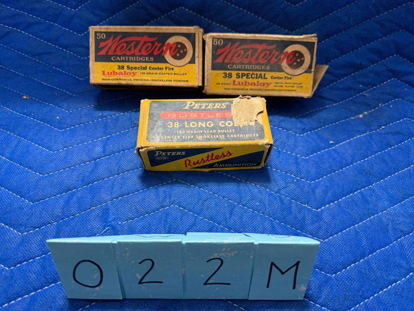 Three Vintage Boxes 38 Caliber Ammo: Three vintage boxes of 38 caliber ammunition. One box of Peters 38 Long Colt, 150 grain lead bullet (50 rounds). One box of Western 38 Special, 158 grain Lubaloy coated bullet (24 rounds). One box of
