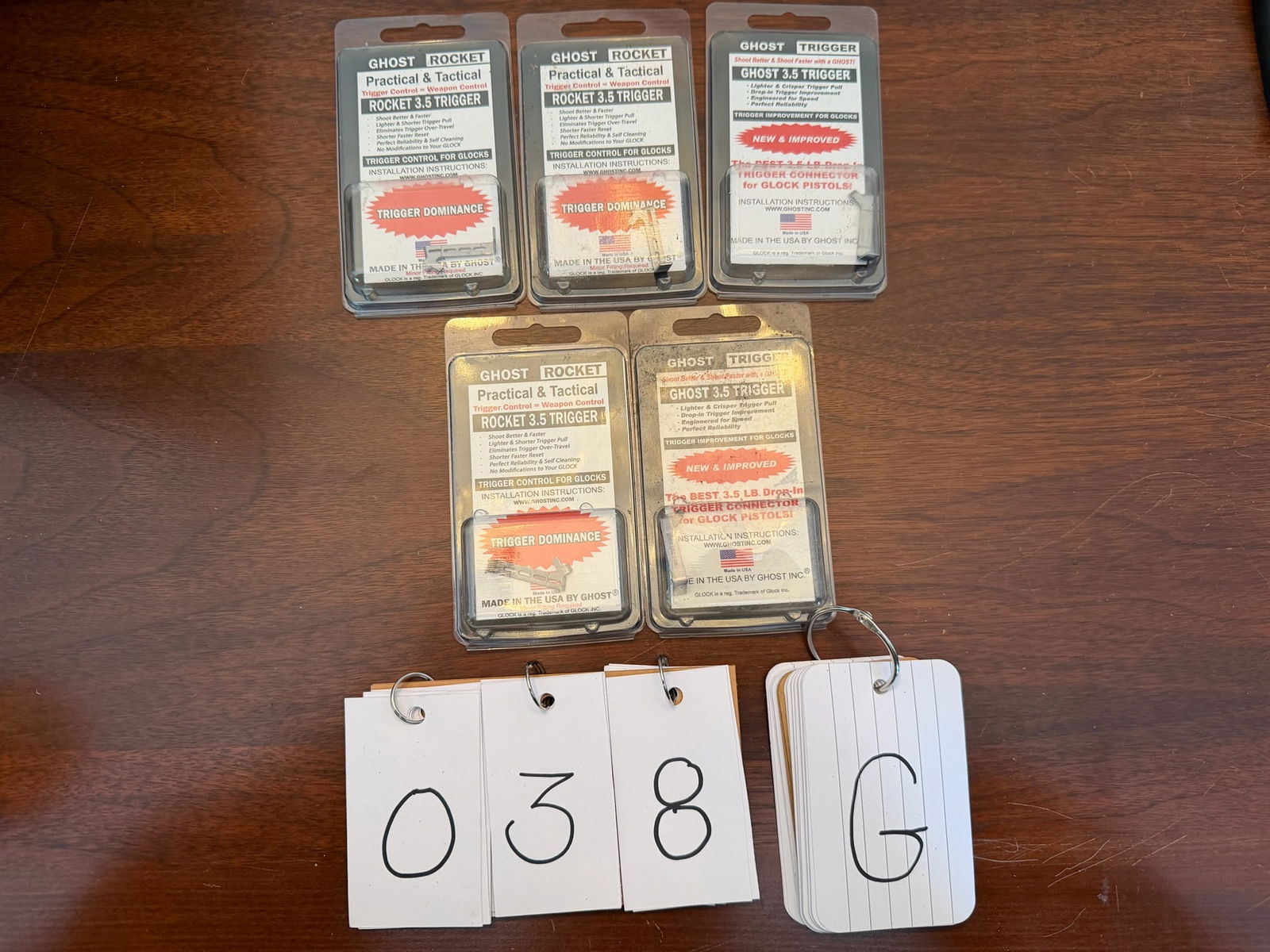 Assorted Lot of New Glock Pieces and Parts: Assorted lot of new Glock pieces and parts. Two sets of Glock backstraps for a Model 17/19. Five Ghost 3.5lb triggers for Glock Models 17-36. One Ghost internal locking system for Glock Models 17-36.